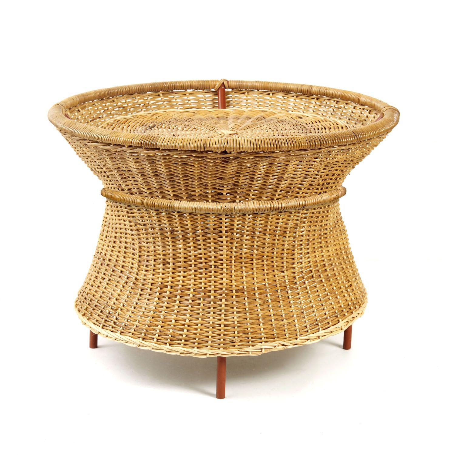 Caribe natural basket table by Sebastian Herkner
Materials: Wicker from Bejuco roots. Galvanized and powder-coated tubular steel frame.
Technique: Weaved by local craftspeople in Colombia. 
Dimensions: Diameter 54.1 x height 41 cm 
Available in