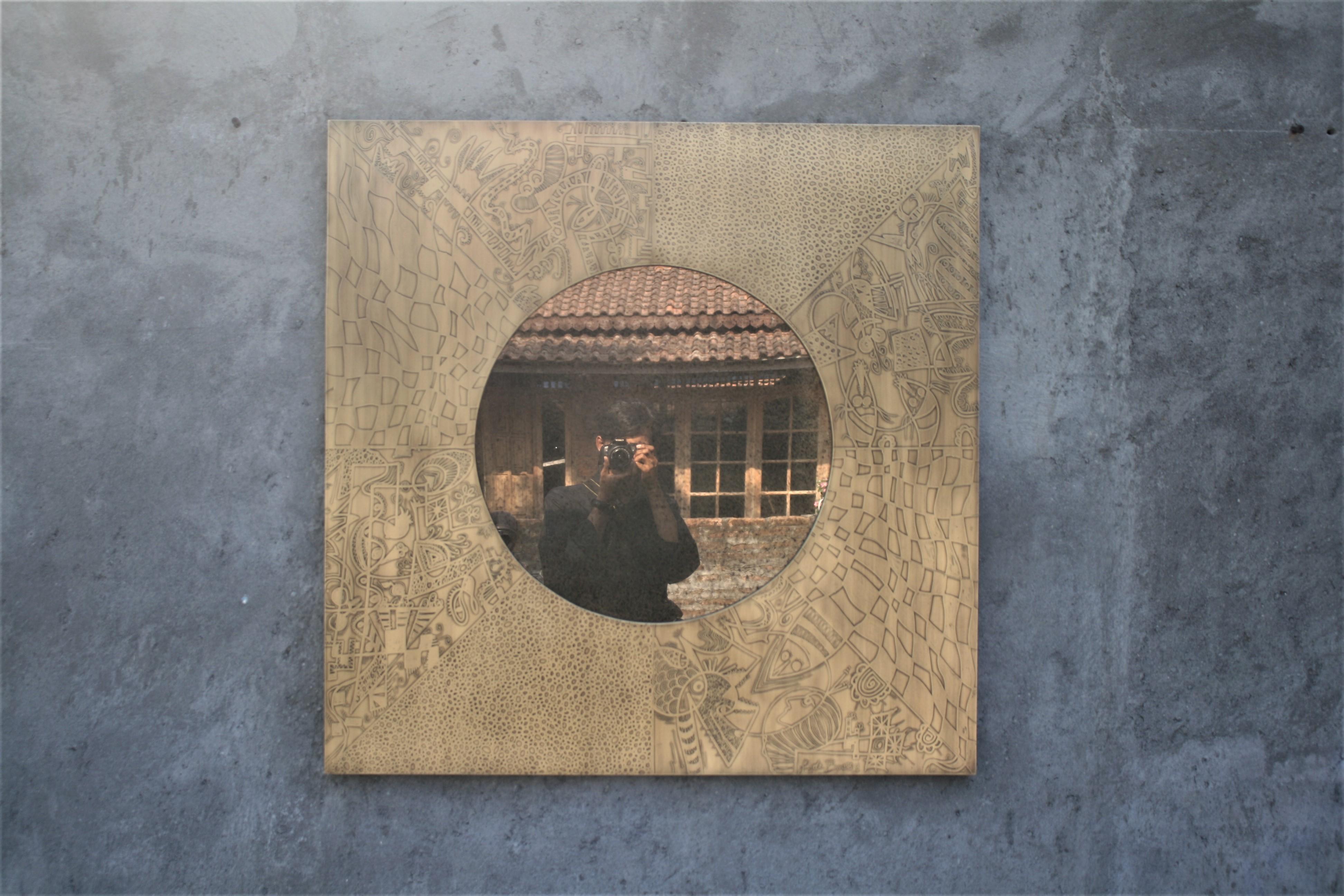 Unique square wall mirror by Studio Belgali, handmade acid etched brass with hand drawn pattern combined with brownish antique mirror. 

Stunning piece of art. Custom made is available.