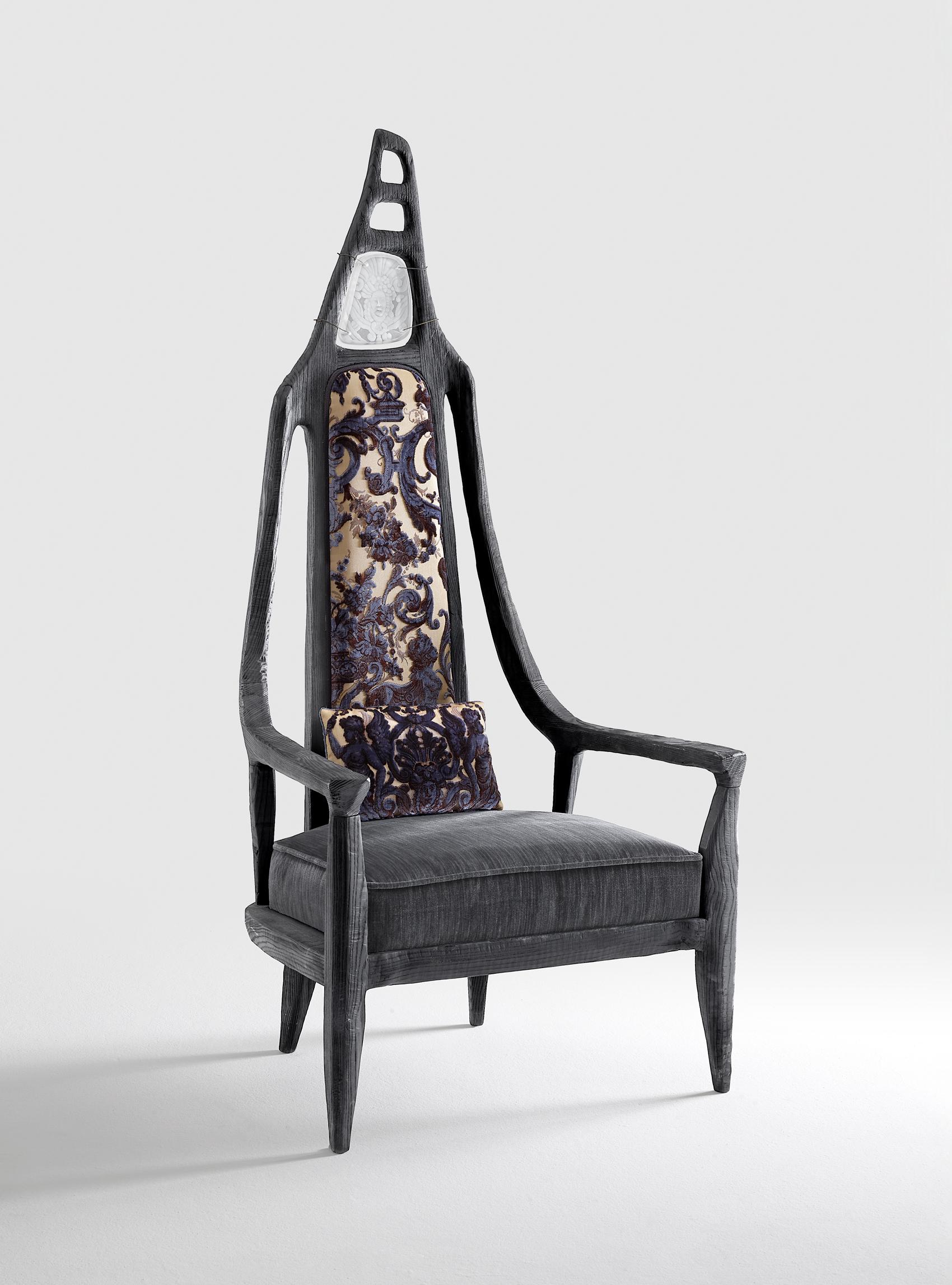 Cariega Chair by Vetralia
Designed by Giovanni Luca Ferreri
Dimensions:  W 80 x D 70 x H 170 cm
Materials: Charred wood, padding covered with Venetian fabric made by Bevilacqua manufacture.

VETRALIA
Functional Art based in Venice
Active in the