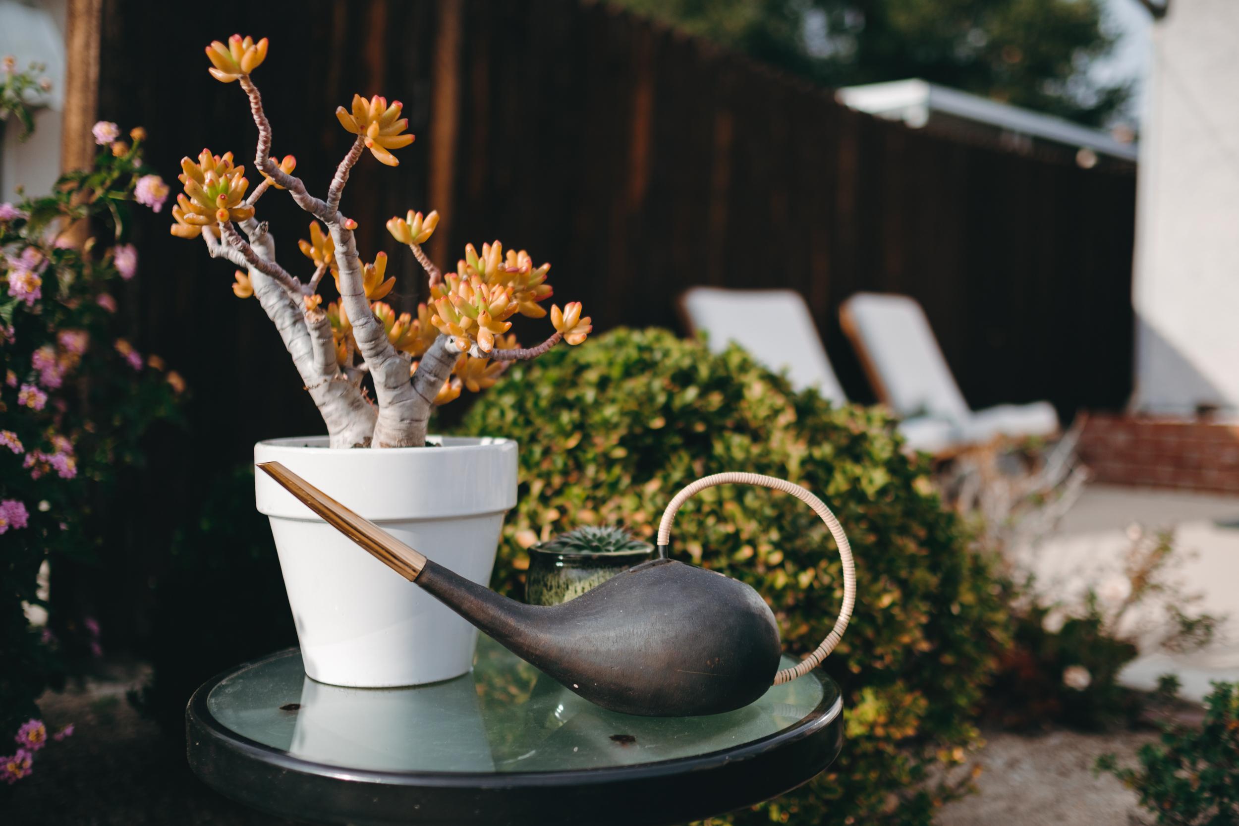 Carl Auböck #3632 watering can in patinated brass and cane. Designed in the 1940s, this incredibly clean and refined Viennese watering can is executed in handwoven cane, polished and darkly patinated brass by Werkstätte Carl Auböck, Austria. 

Price