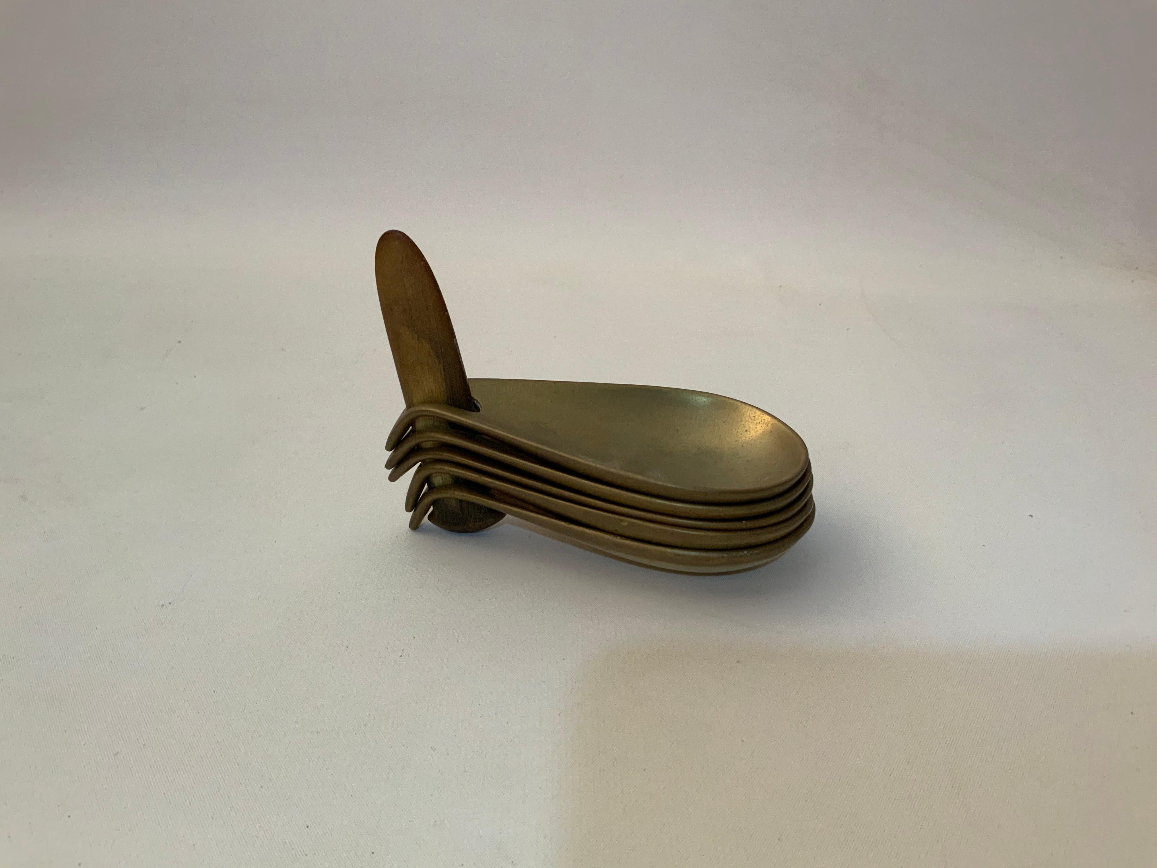 Five solid brass form #3904 nesting bowls or ashtrays with the original bone insert. Spectacular concept and design by the Austrian designer, circa 1950.