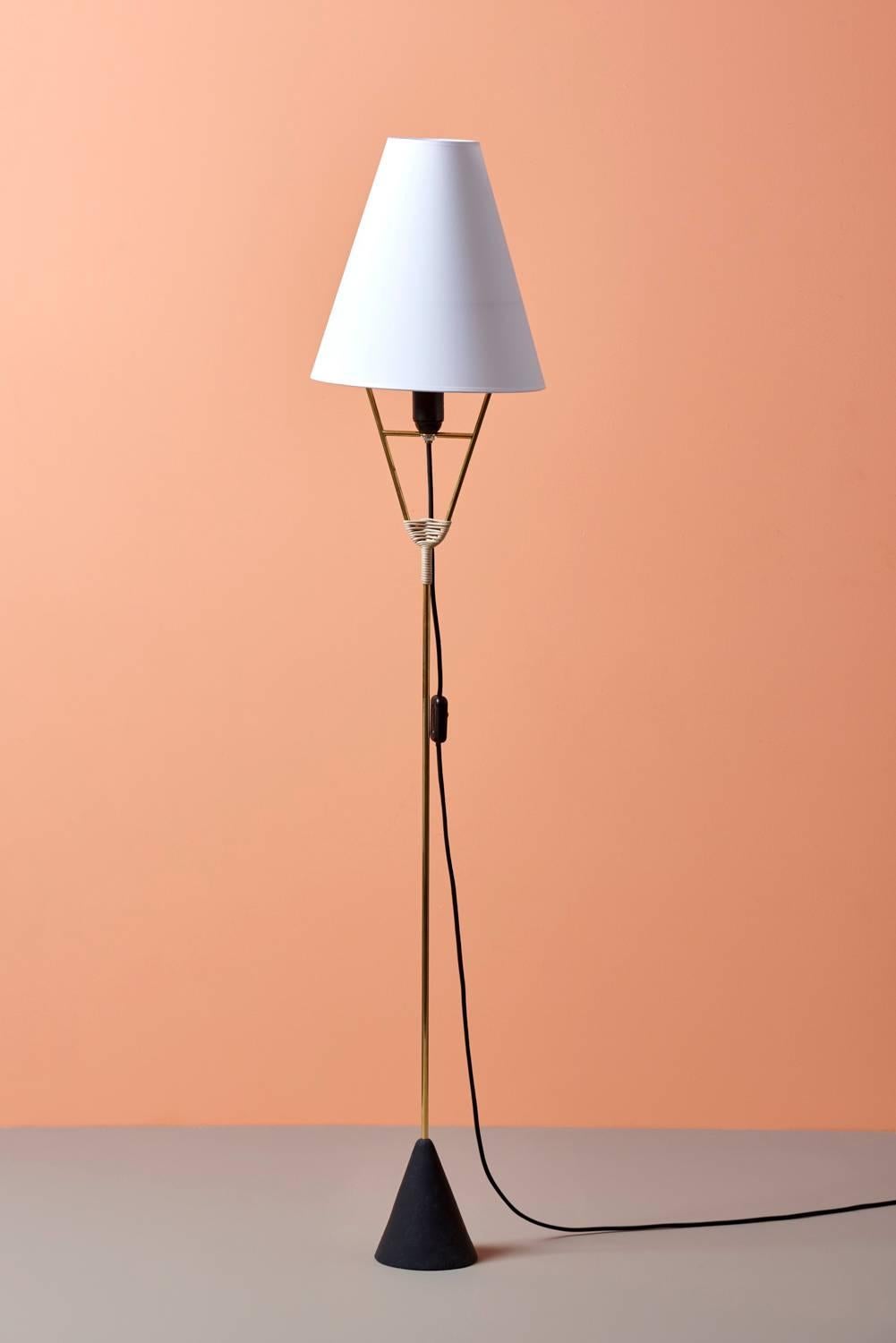 Vice versa lamp #4105 by Carl Auböck in brass, cane detail and painted metal.

