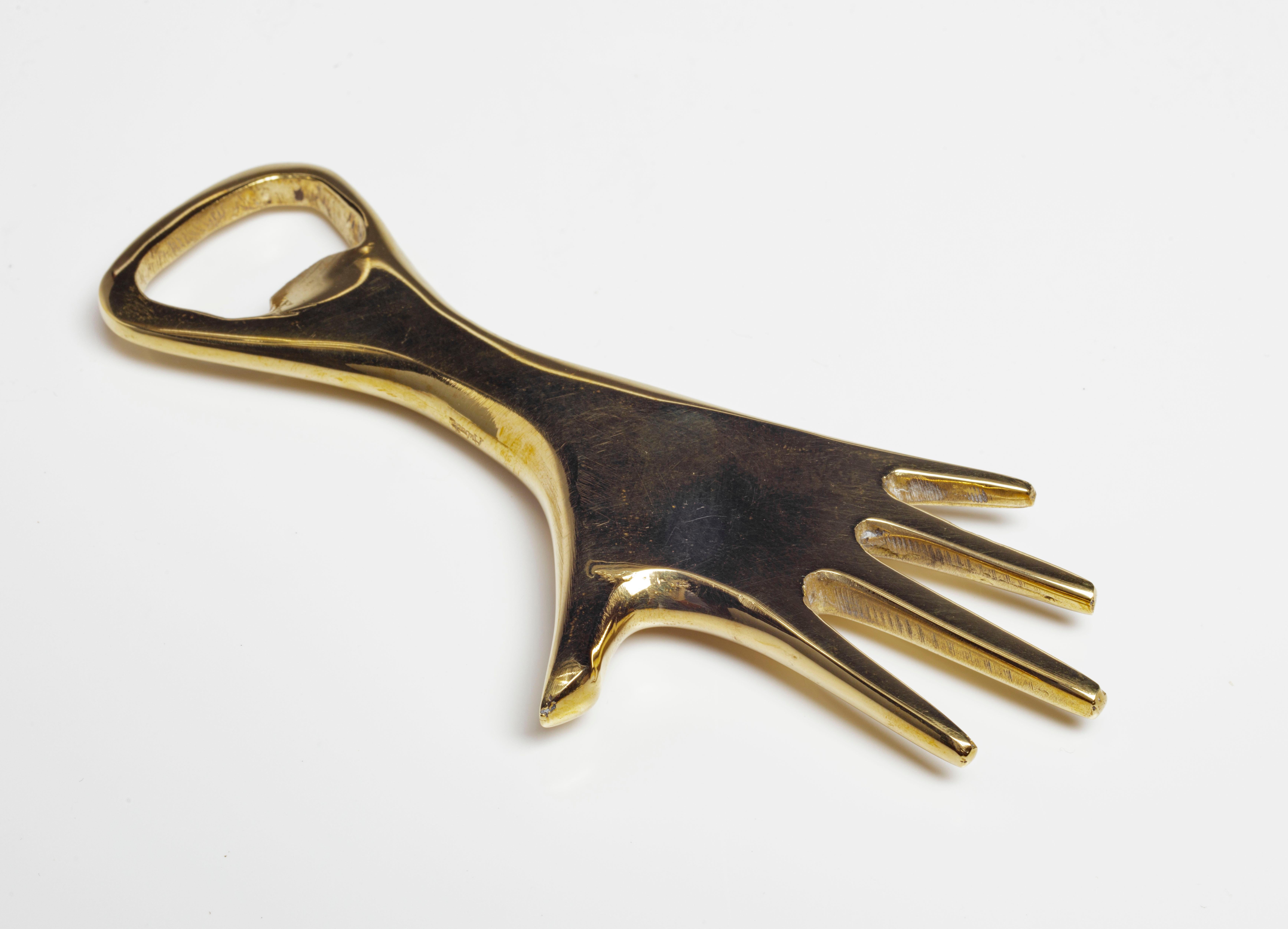 brass hand bottle opener