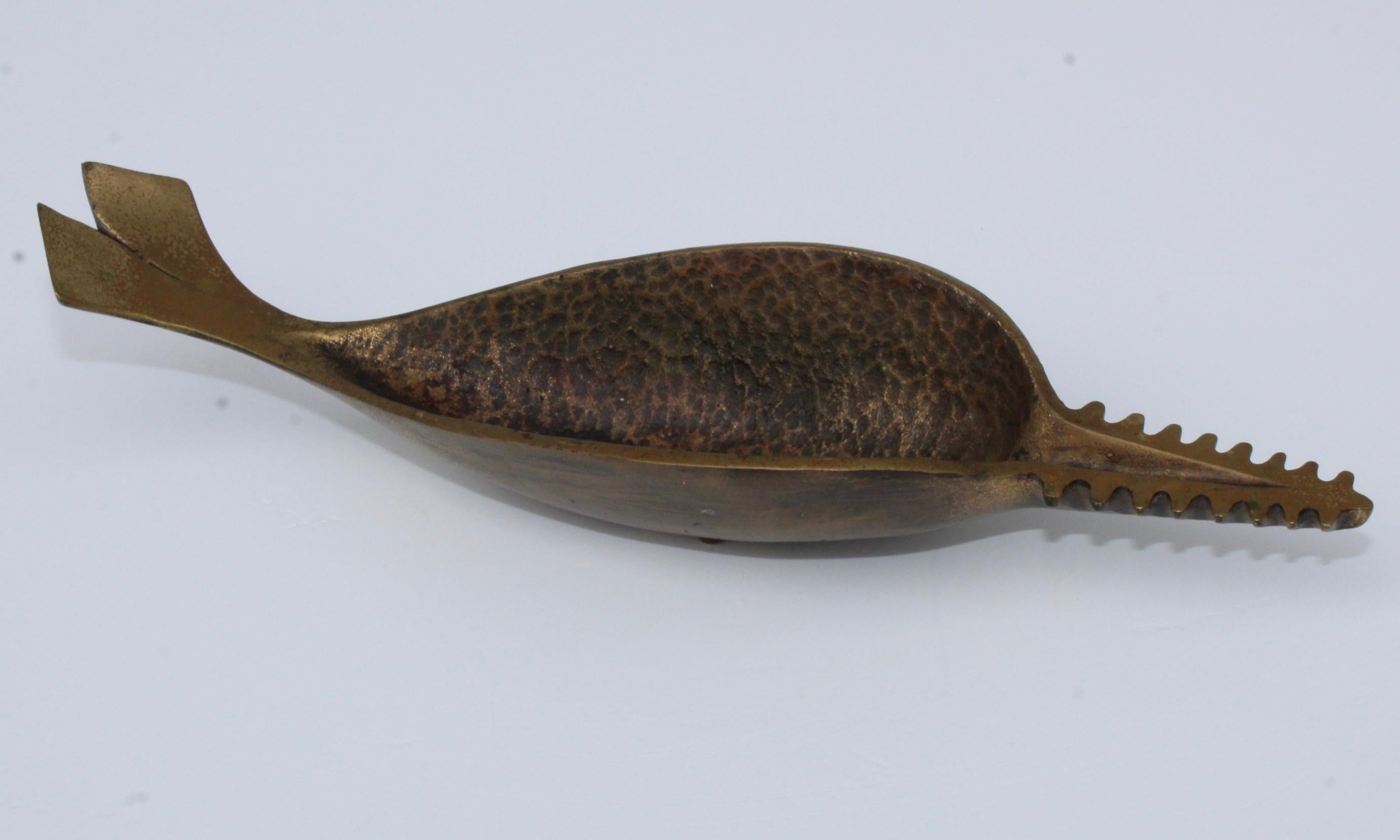 1950's brass fish ashtray attributed to Carl Auböck, in vintage original condition with some wear and patina due to age and use.