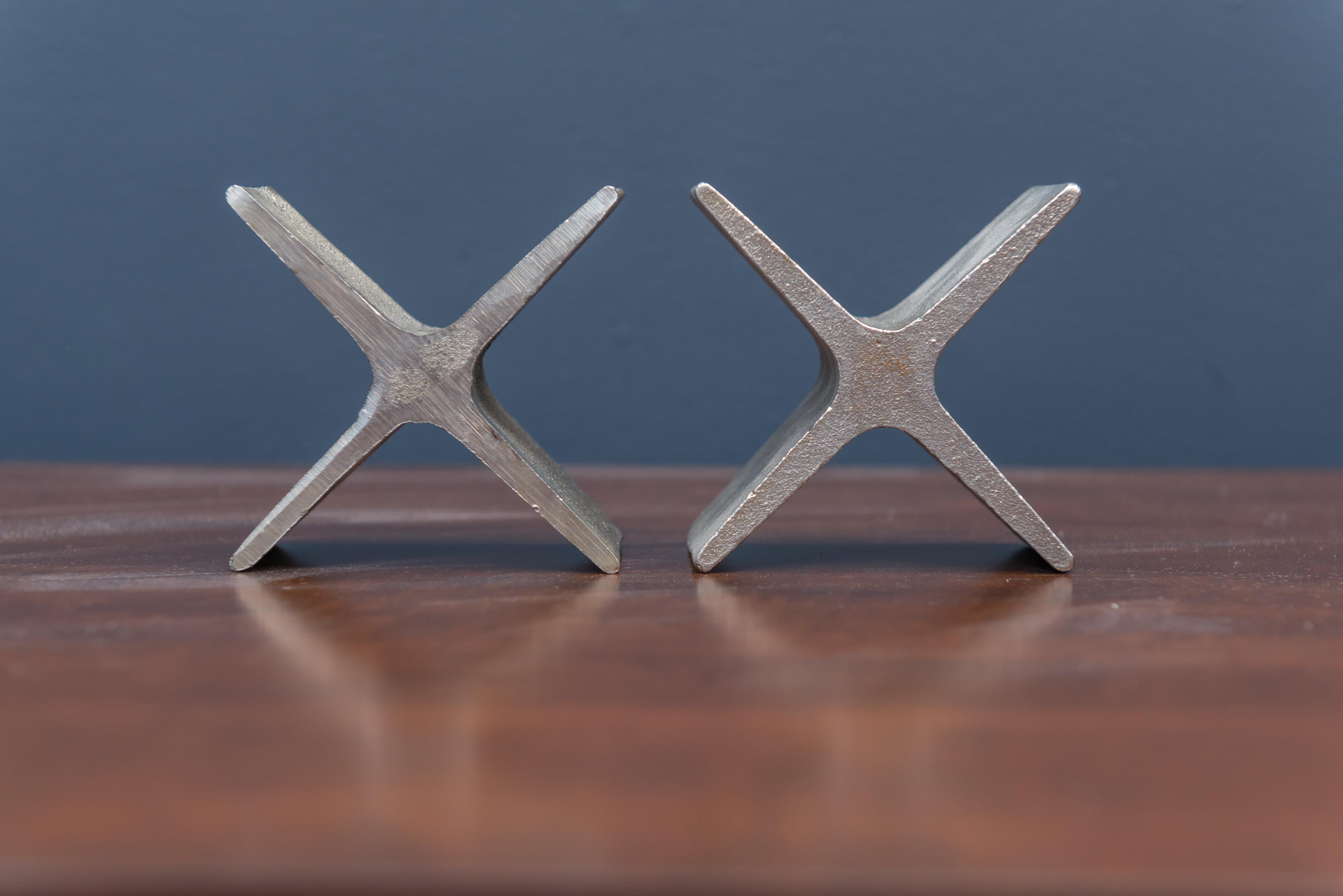 Pair of Carl Auböck design bookends in solid cast steel, Austria.