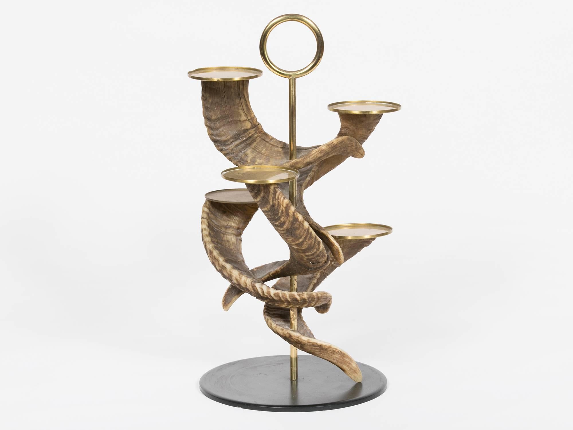 Mouflon horn, brass and enameled steel candelabrum by Viennese master designer Carl Auböck. Holds four candles; original from 1961.