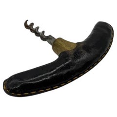 Carl Auböck corkscrew, brass & leather, designed around 1950