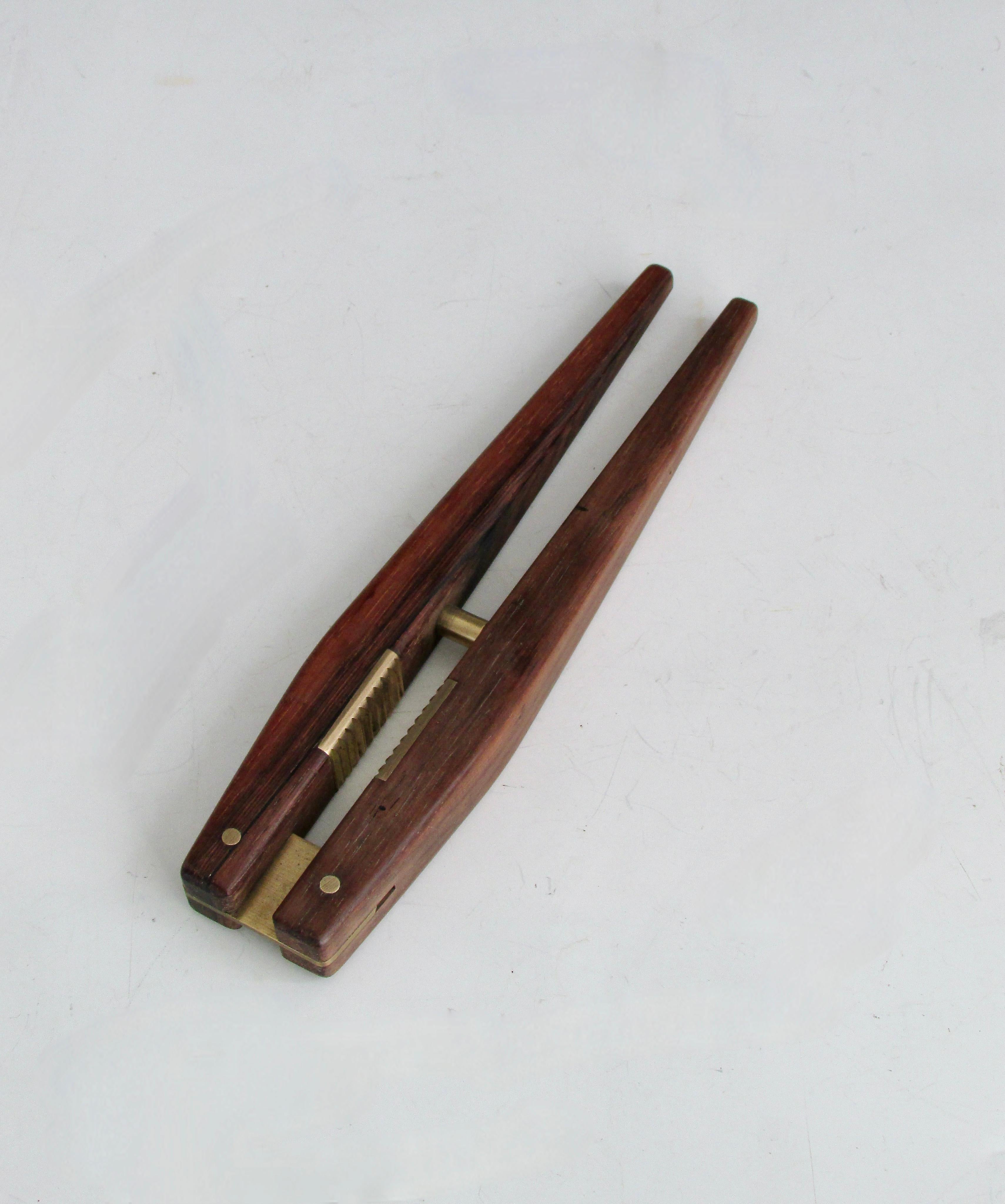 Hand-Crafted Carl Aubock era style Erik Knudsen Rosewood with brass nutcracker For Sale