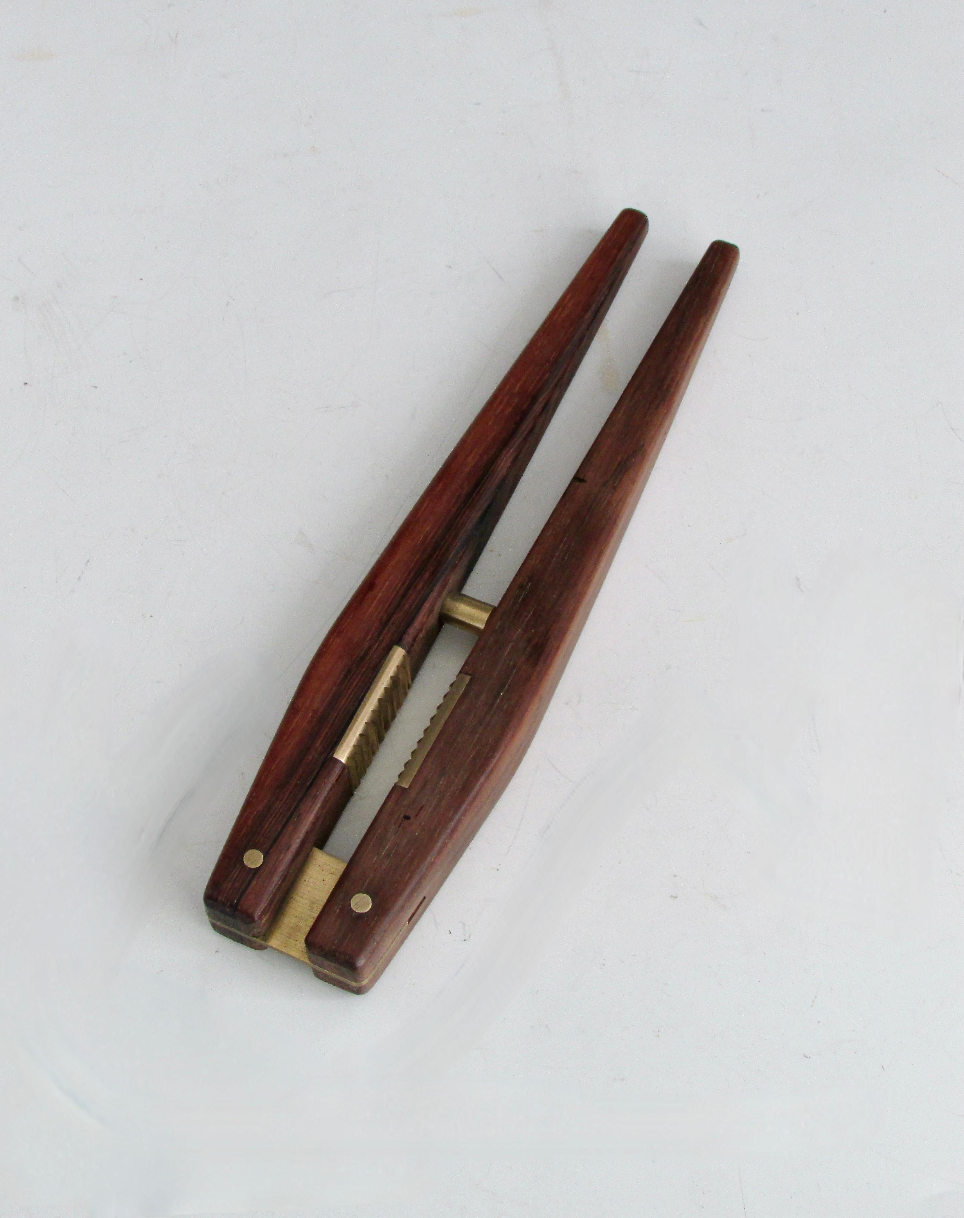 20th Century Carl Aubock era style Erik Knudsen Rosewood with brass nutcracker For Sale