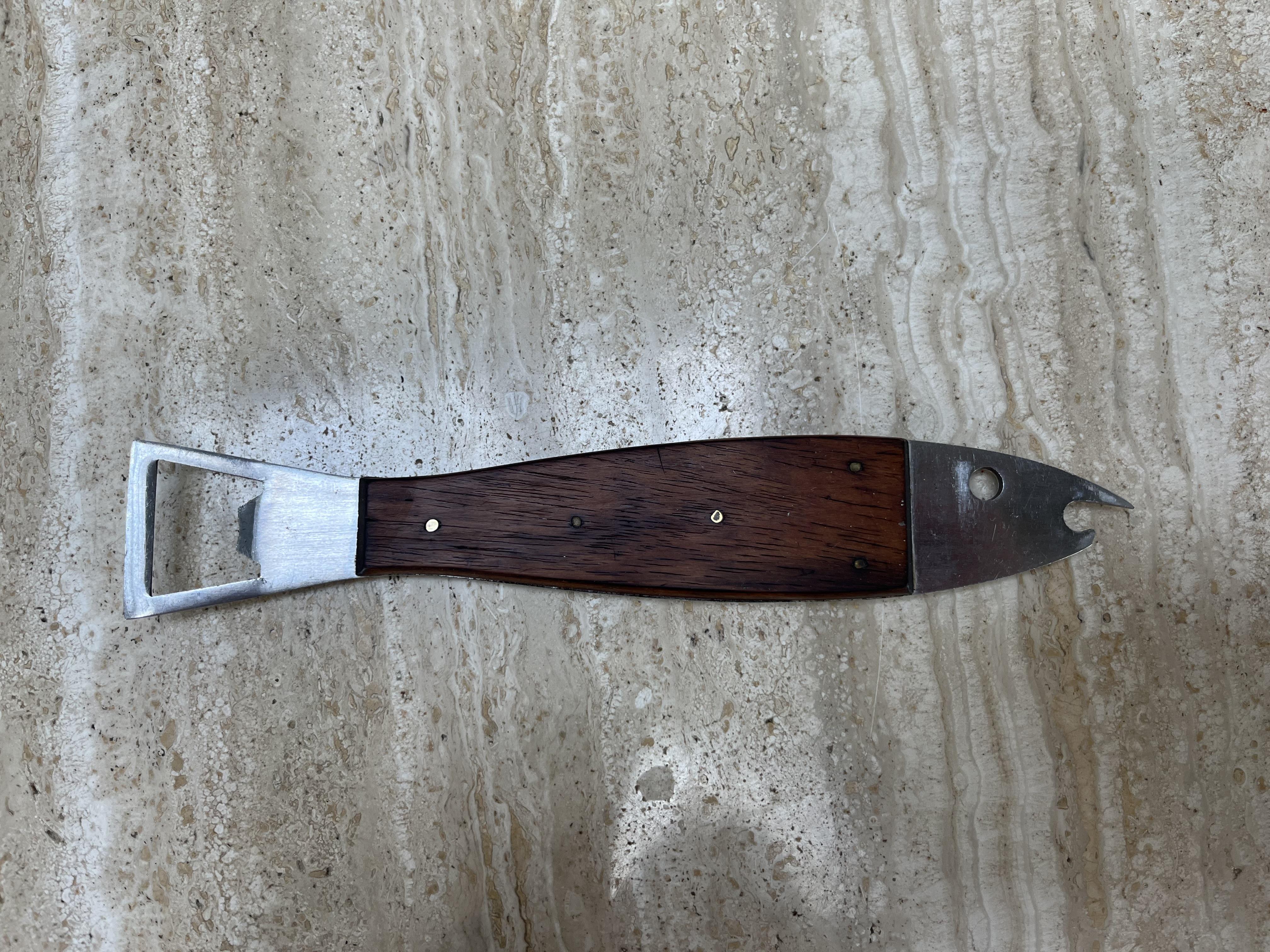 Mid-century modern Carl Auböck bottle opener, metal and teak wood. 