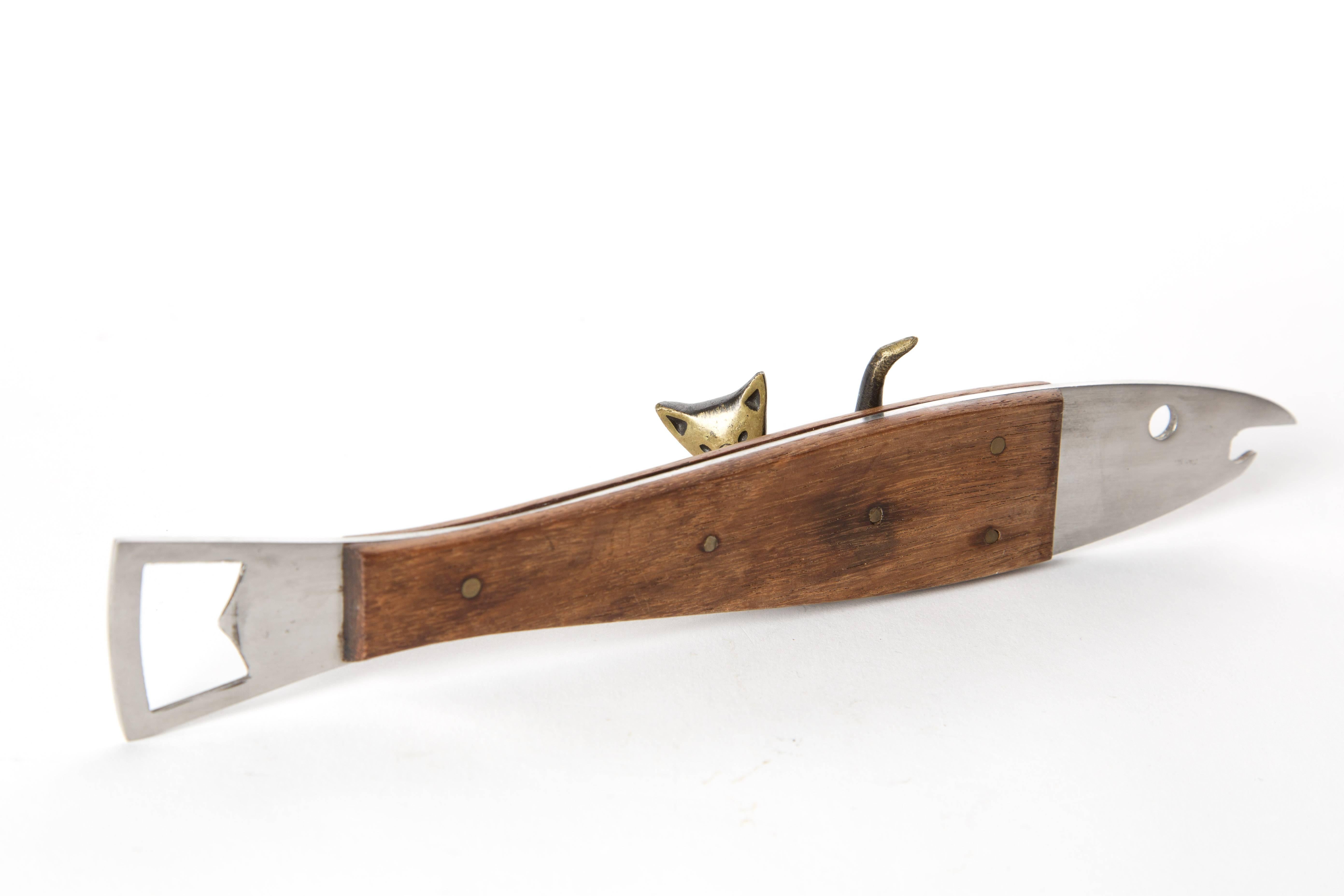 Carl Aubock style. Bottle opener as a fish. With stainless steel and wood.
The original version is published in the book Carl Auböck, the workshop, Clemens Kois. 