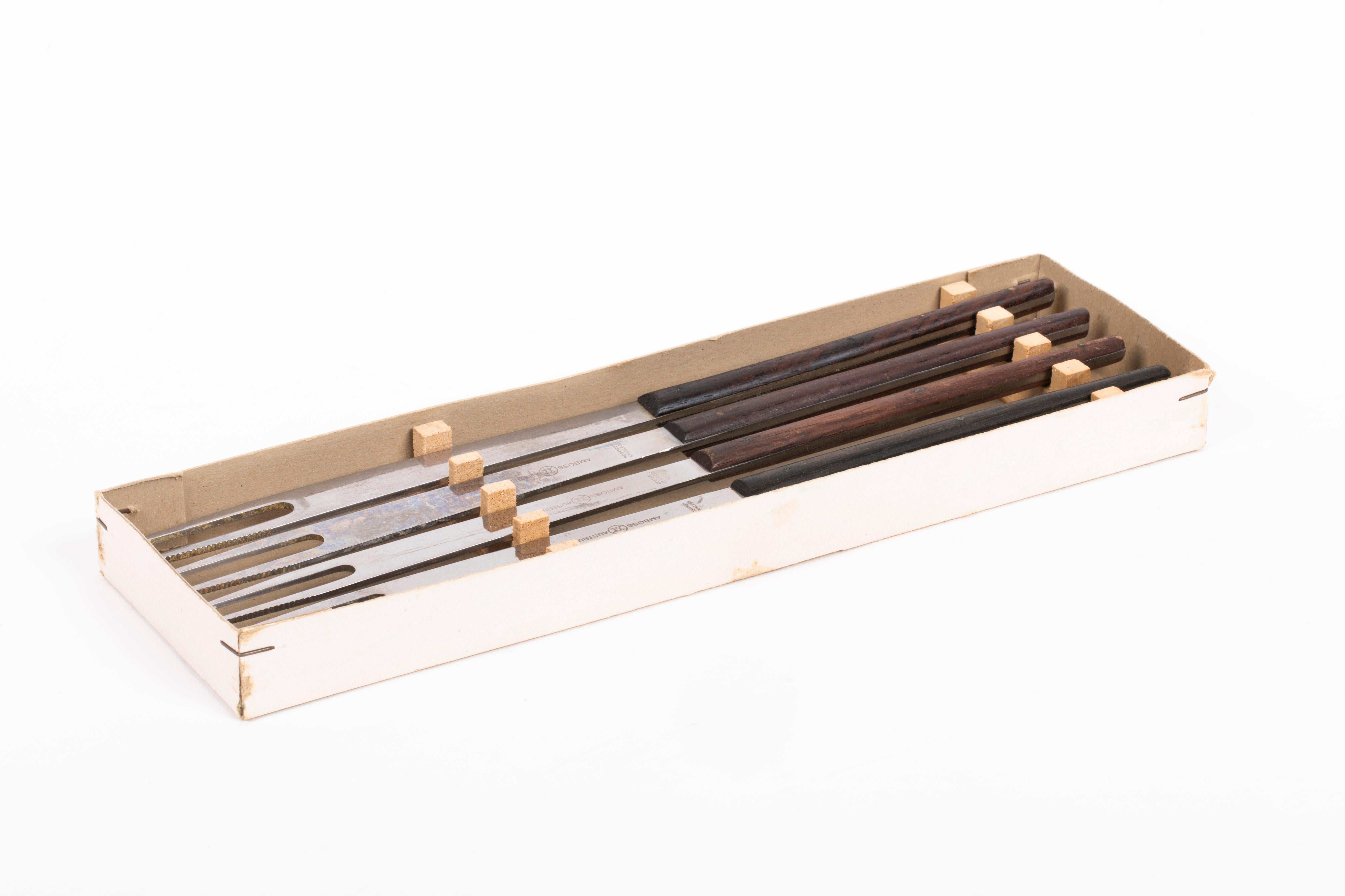 Carl Auböck Set of 4 Fondue Forks, Austria 1960s. The measurements given apply to one fork. The box is 25.5 cm wide, 2cm deep and 7.5 cm high. 