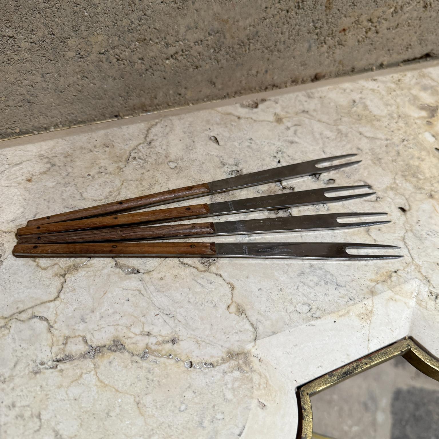 For your consideration a set of four Fondue forks designed by Stainless- Carl Aubock for Amboss . Made in Austria . Stamped: Rostfrei Stainless, AMBOSS AUSTRIA.

Dimensions: 9.63 long x .38 wide at thickest point x 5/16 D


Please visit take a look