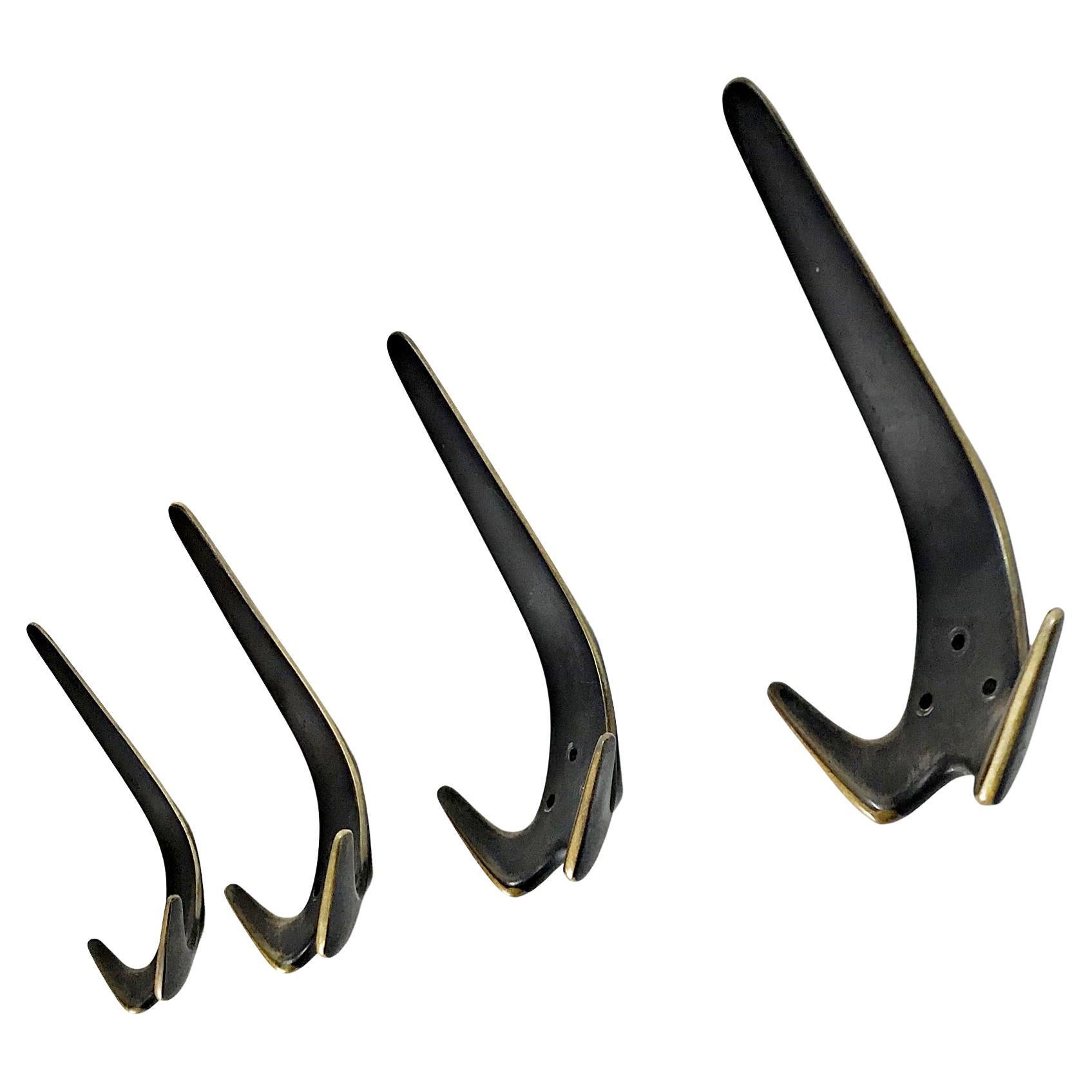 Carl Auböck Four Midcentury Patinated Brass Wall Coat Hooks, 1950s, Austria