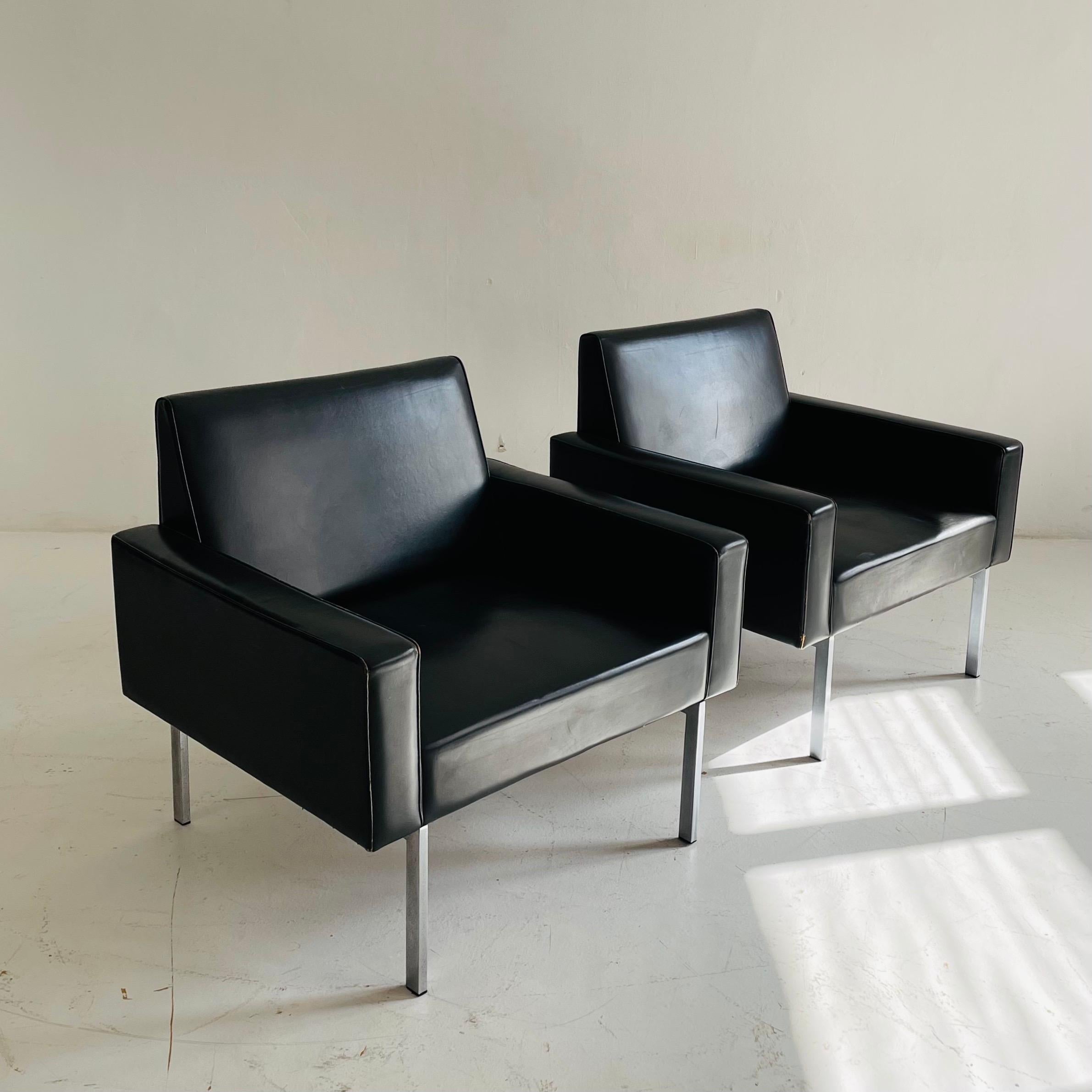 Patinated leather arm lounge chairs, Austria, 1960s.