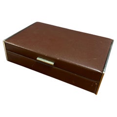 caja de cuero y cromo de carl auböck.