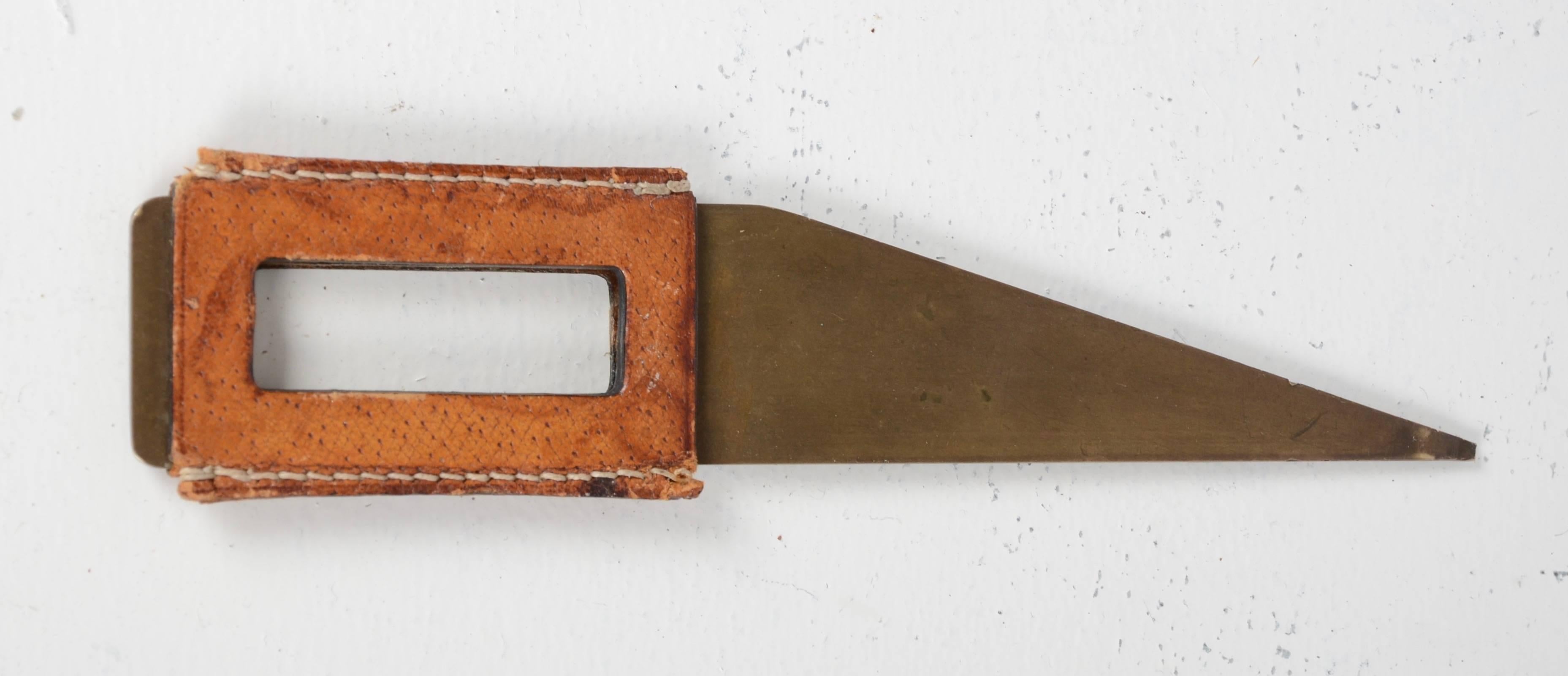 Letter opener by Carl Auböck. Made in brass with leather handle, Austria, 1950s.