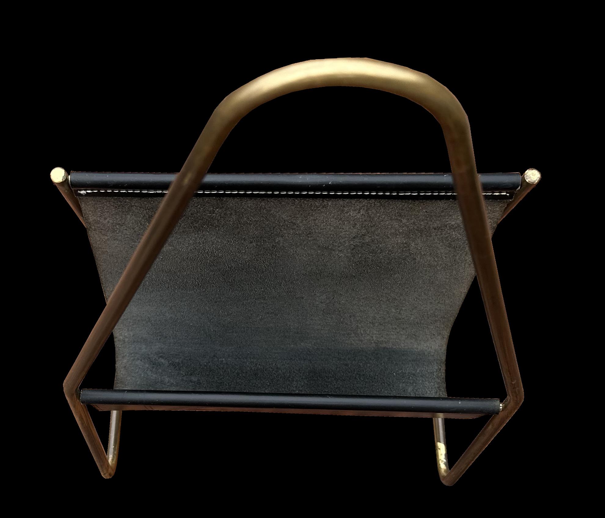 A very nice original magazine rack by Carl Aubock for Aubock Werkstatte in Vienna, this one in brass with black leather.