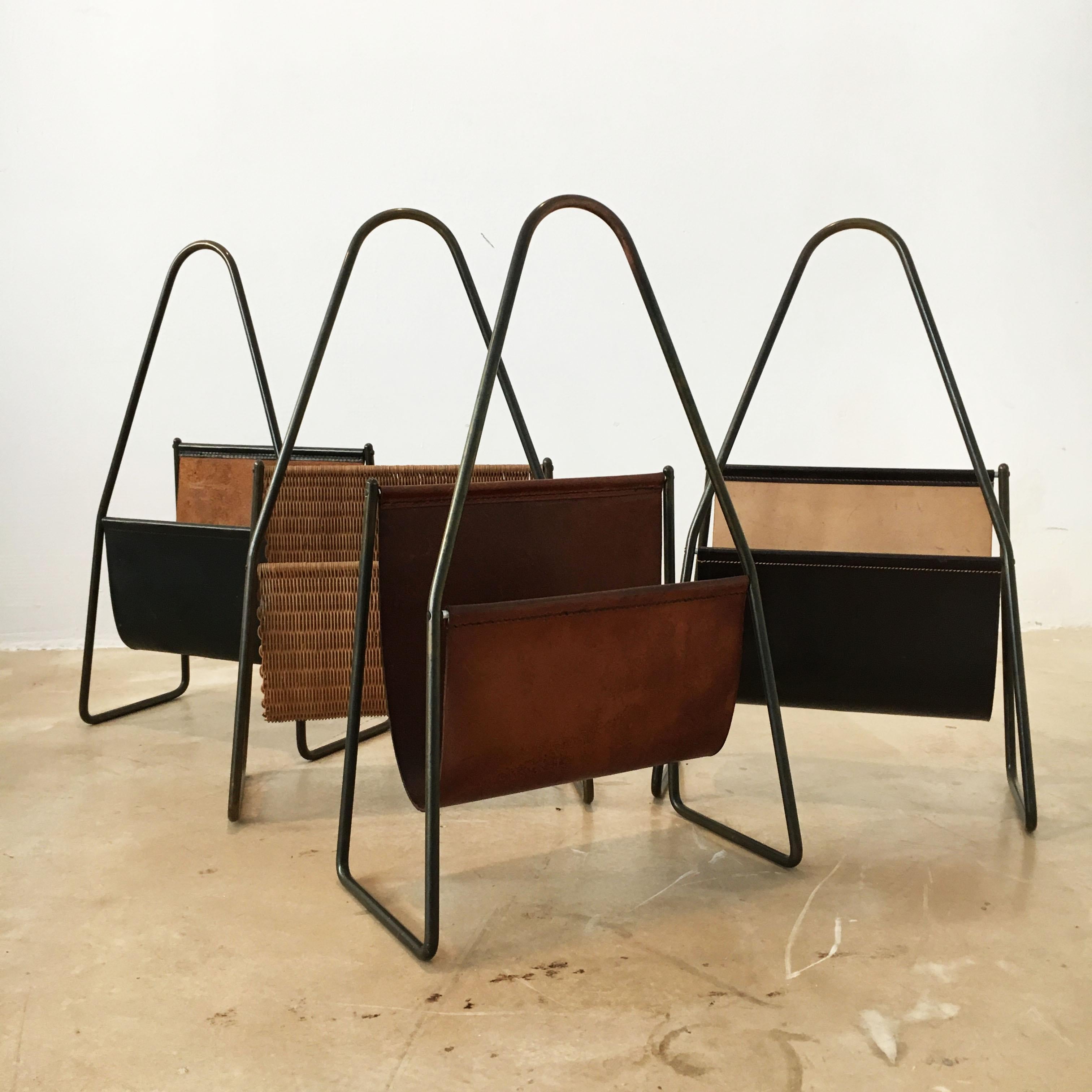 Carl Auböck magazine stand collection, group of four, Austria, 1950s.