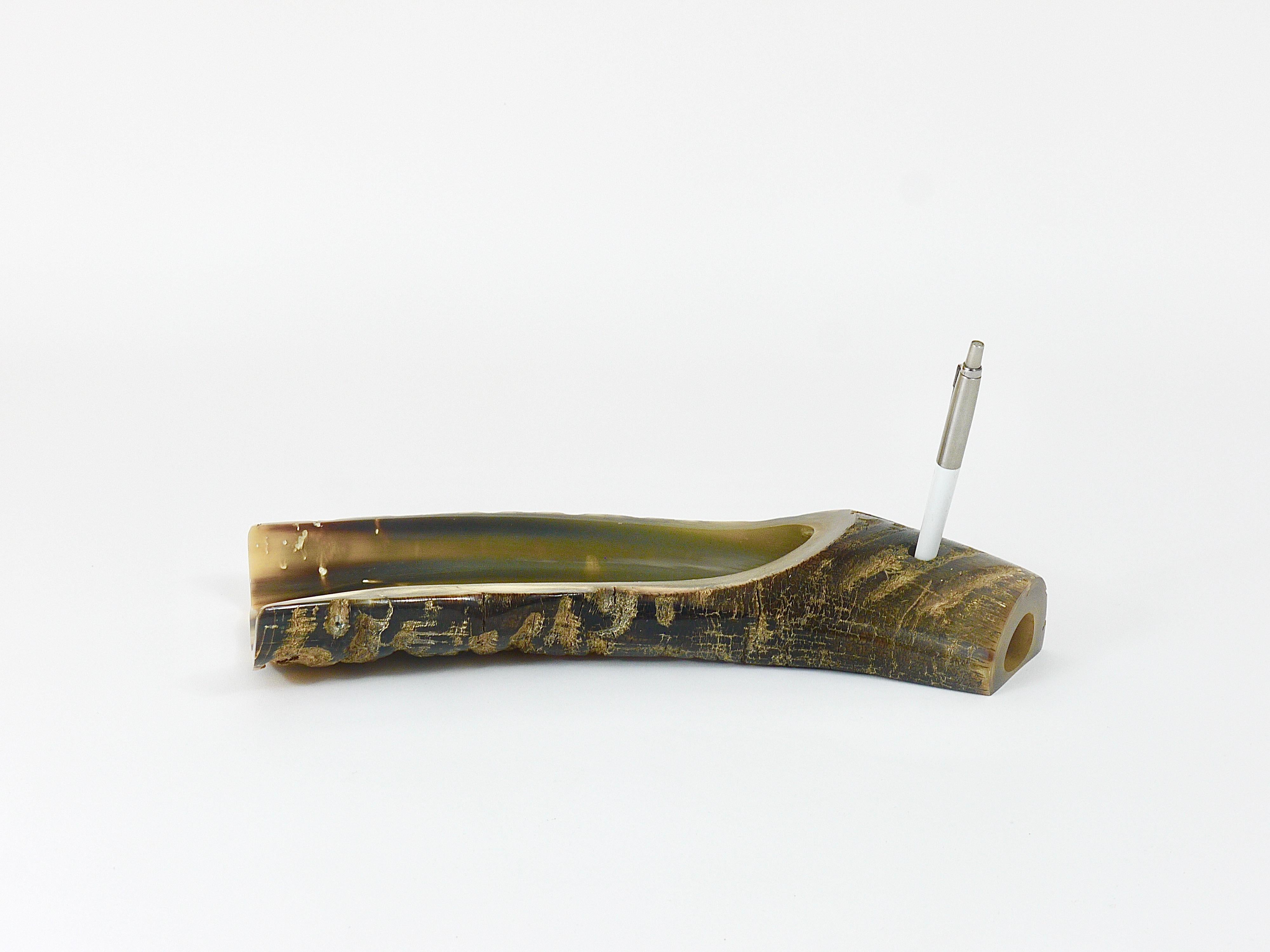 A decorative and rare desk penholder from the 1960s, designed and executed by Carl Aubock, Vienna. Made of horn, in very good condition.
