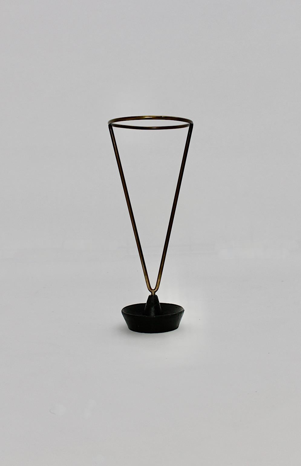 Mid-Century Modern vintage authentic umbrella stand or cane holder by Carl Auböck for workshop Auböck, 1950s Austria.
The authentic umbrella stand is in original condition with beloved signs of age and use like patina.
The wonderful umbrella stand