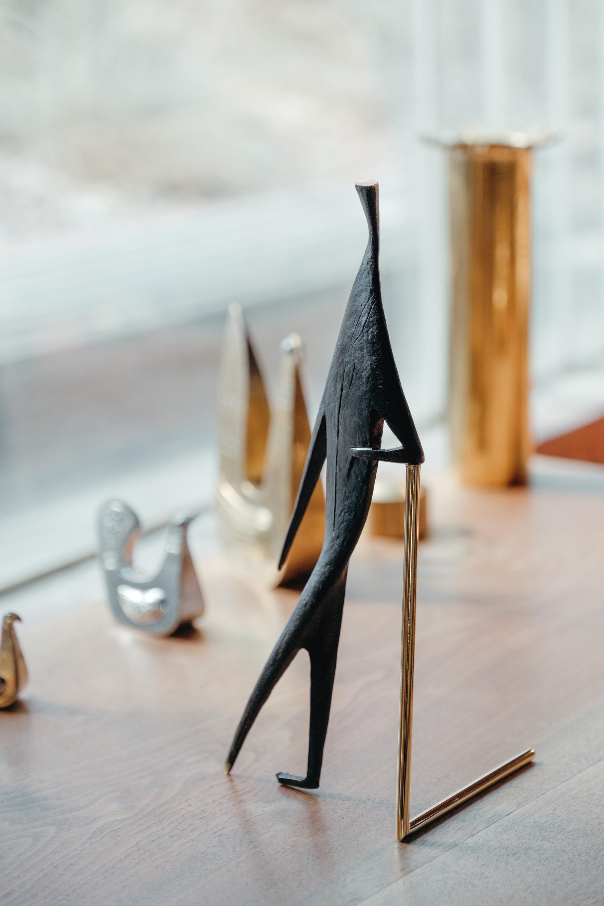 Carl Aubo¨ck Model #4060 'Man With Stick' brass sculpture. Designed in the 1950s, this incredibly refined and sculptural figure is executed in polished and patinated brass. 

Price is per item. Available in unlimited quantities.

One in stock and