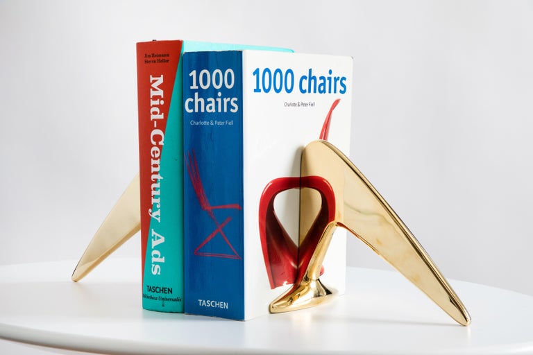 Carl Aubo¨ck model #4630 large brass bookends. Designed in the 1950s, this incredibly refined and sculptural pair of bookends are executed in polished brass. 

Price is for the pair. Two in stock ready to ship. Available in unlimited quantities.