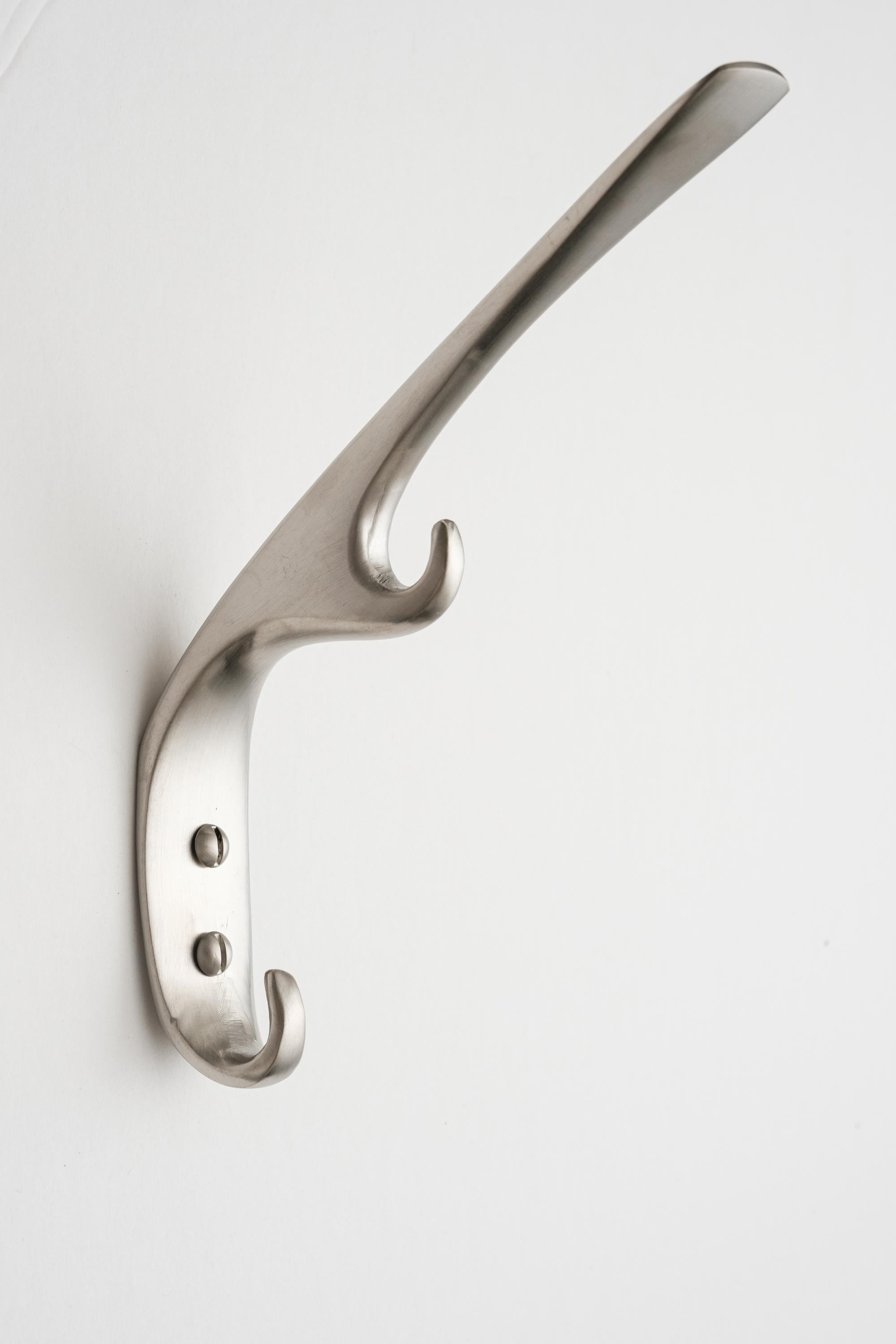 Carl Auböck #5439 hook in nickel. Designed in the 1950s, this versatile and Minimalist Viennese hook is executed in softly brushed nickel by Werkstätte Carl Auböck, Austria.

Produced by Carl Auböck IV in the original Auböck workshop in the 7th