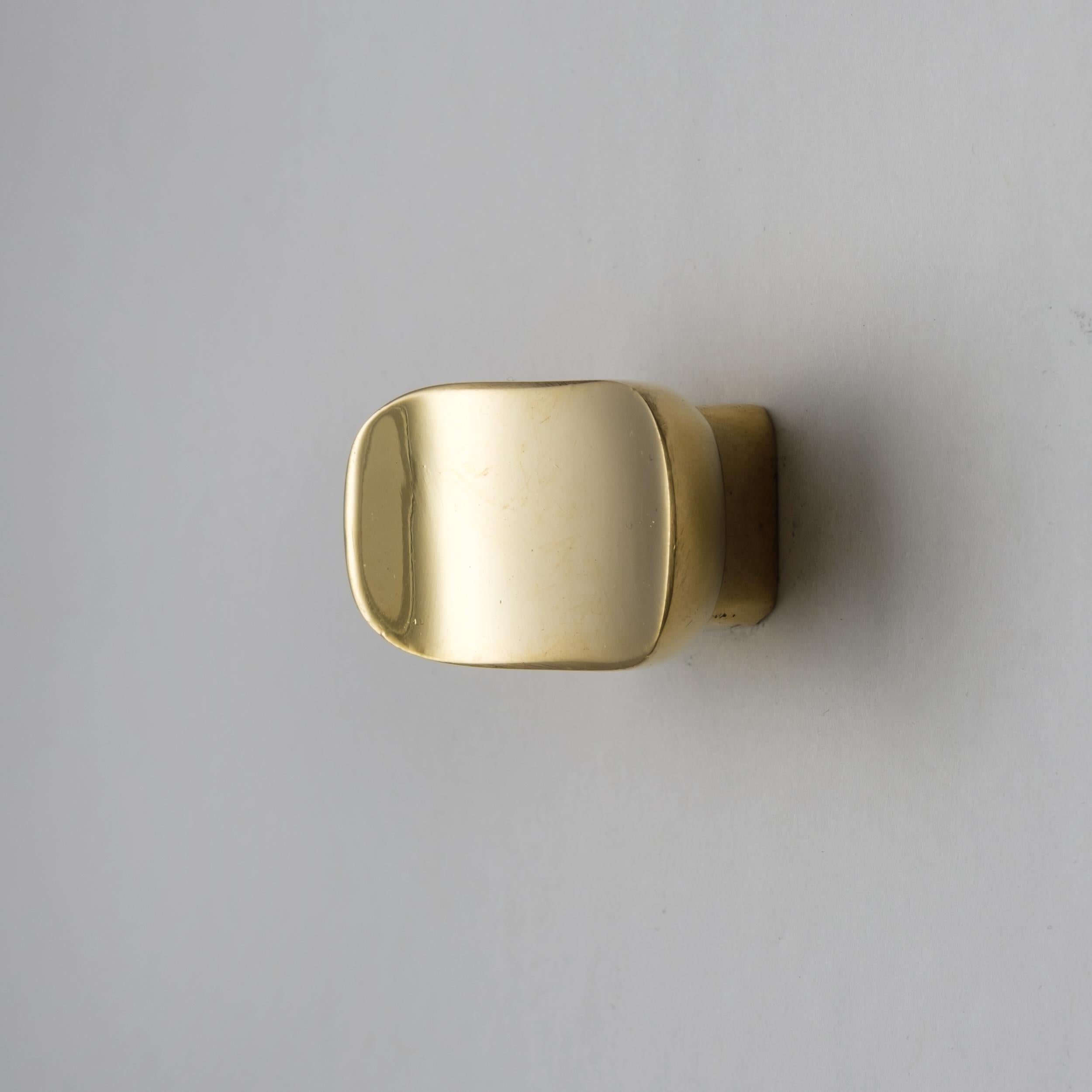 Carl Auböck Model #9038 polished brass knob.

Designed in the 1950s, this versatile and Minimalist Viennese knob is executed in polished brass by Werkstätte Carl Auböck, Austria. Its minimalist design combines clean form with