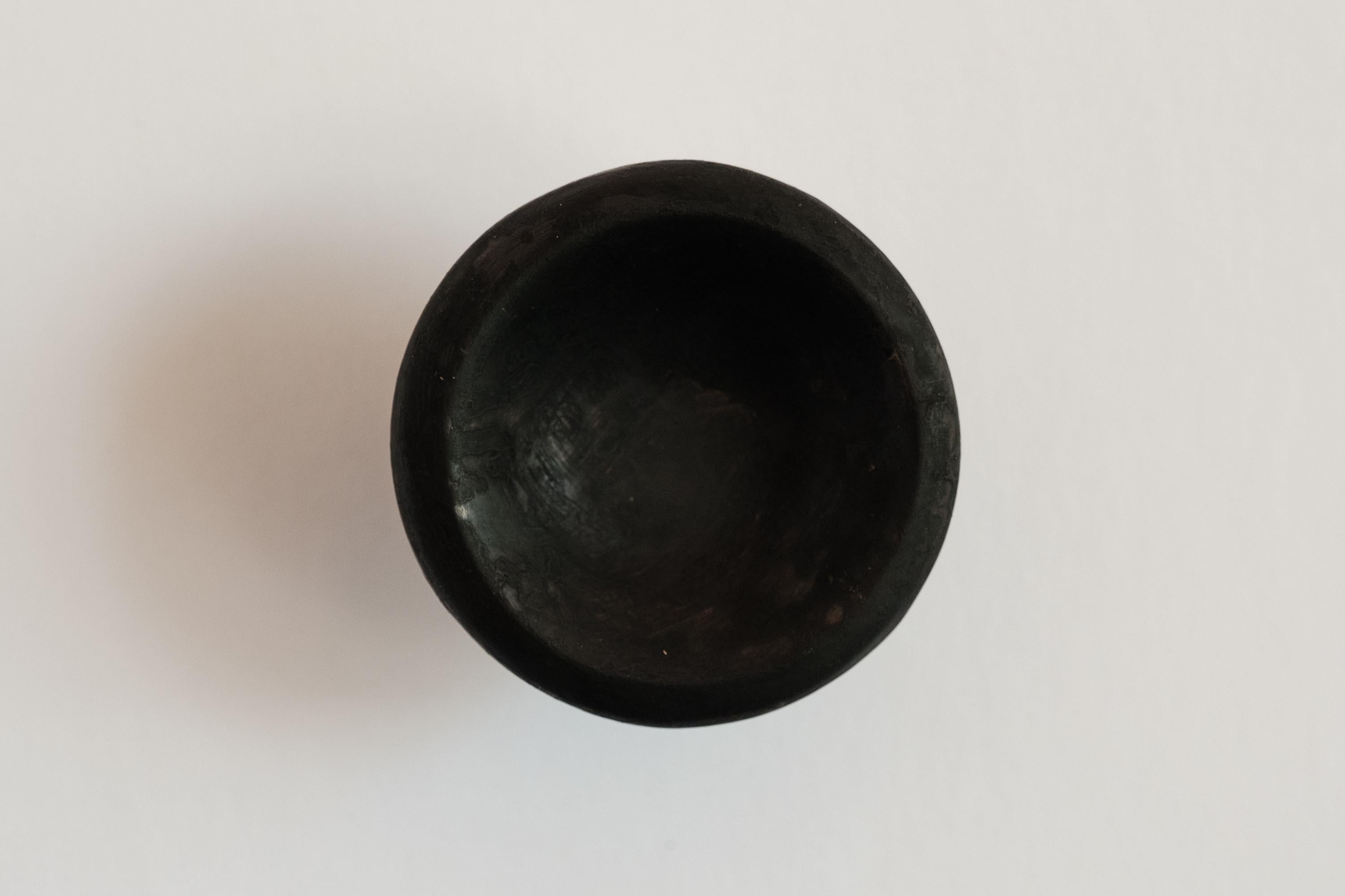 Carl Auböck Model #8040-1 patinated brass knob.

Designed in the 1950s, this versatile and Minimalist Viennese knob is executed in patinated brass by Werkstätte Carl Auböck, Austria. Its minimalist design combines clean form with