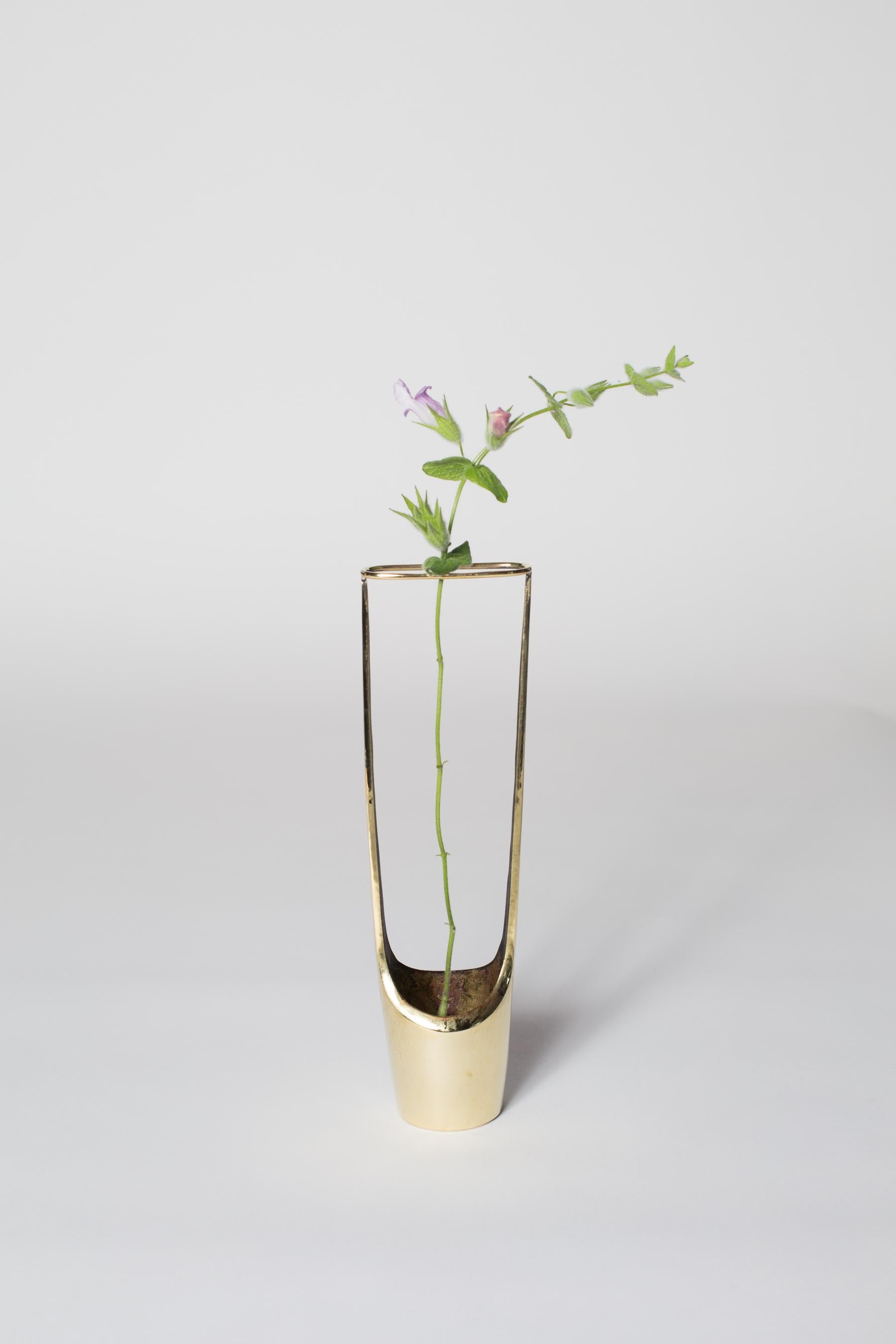Carl Auböck model #7228 polished brass vase designed in the 1950s, this incredibly refined and sculptural Viennese vase is executed in polished and darkly patinated brass by Werkstätte Carl Auböck, Austria. Signature in brass.

Price is per item. 3