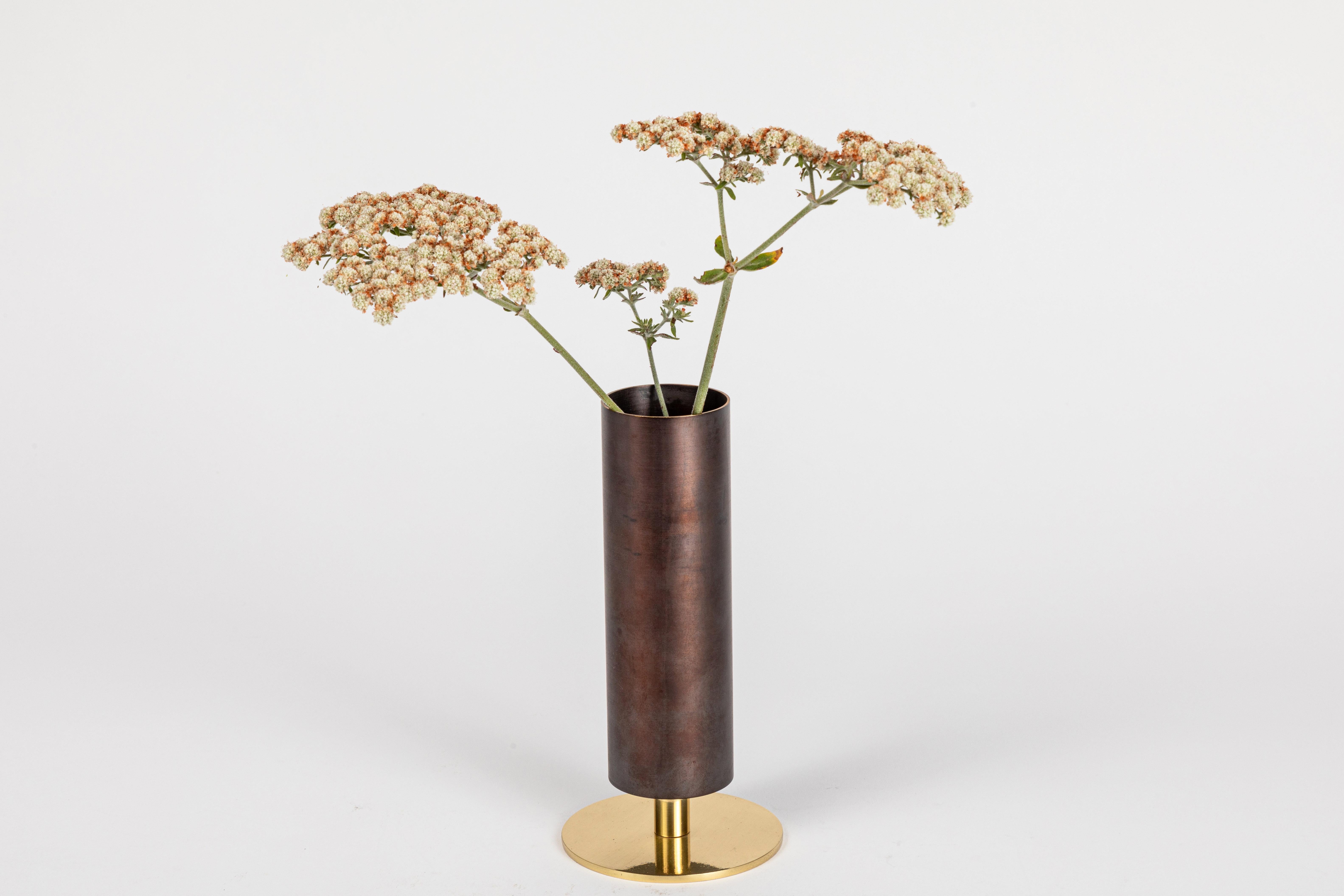 Carl Auböck model #7247 brass vase. Designed in the 1950s, this incredibly refined and sculptural Viennese vase is executed in darkly patinated and polished brass by Werkstätte Carl Auböck, Austria.

Price is per item. Available in unlimited