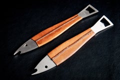 Pair of fish-shaped bottle openers in Leather and Steel by Carl Auböck Austria