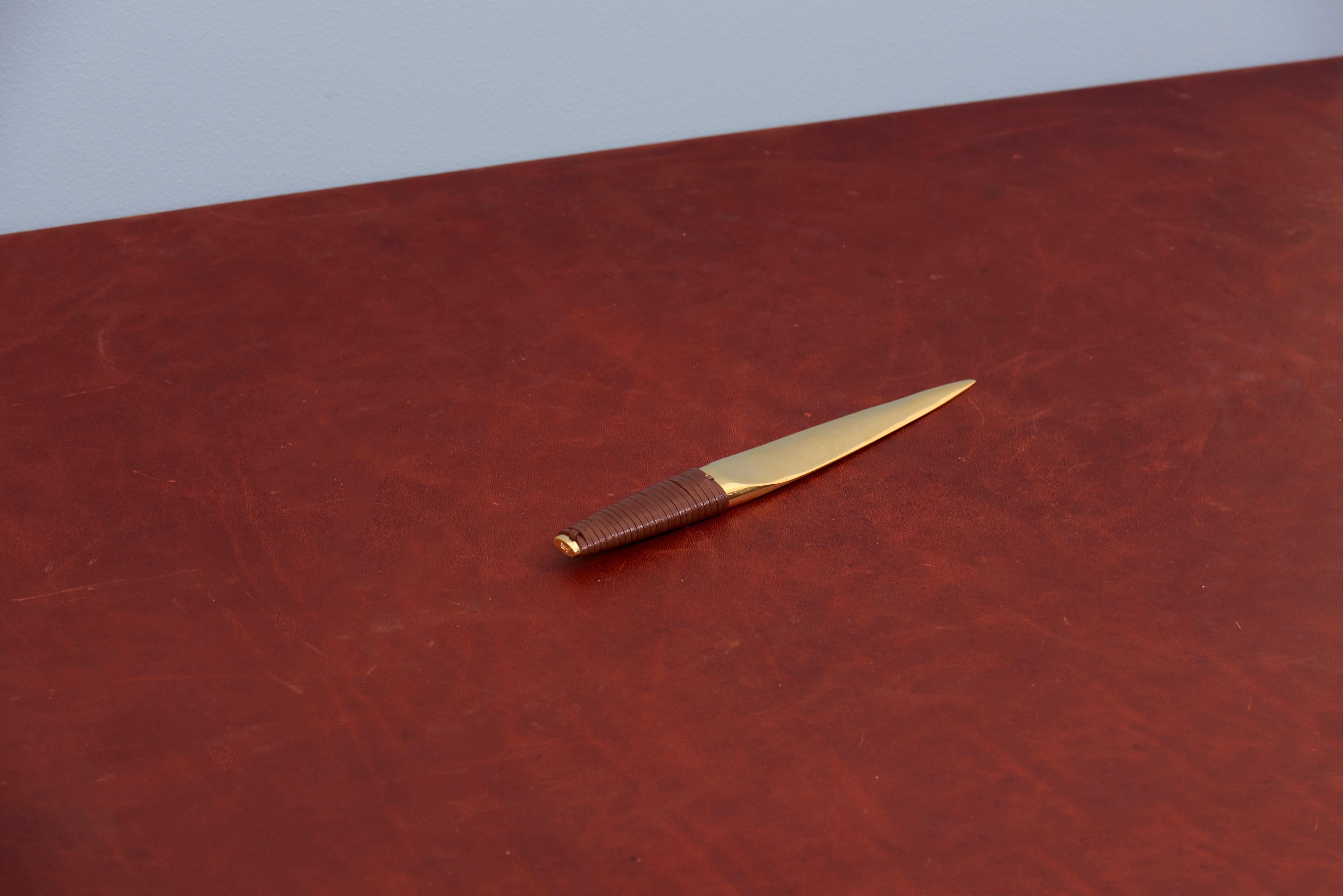Paperknife with brown leather handle by Carl Auböck.