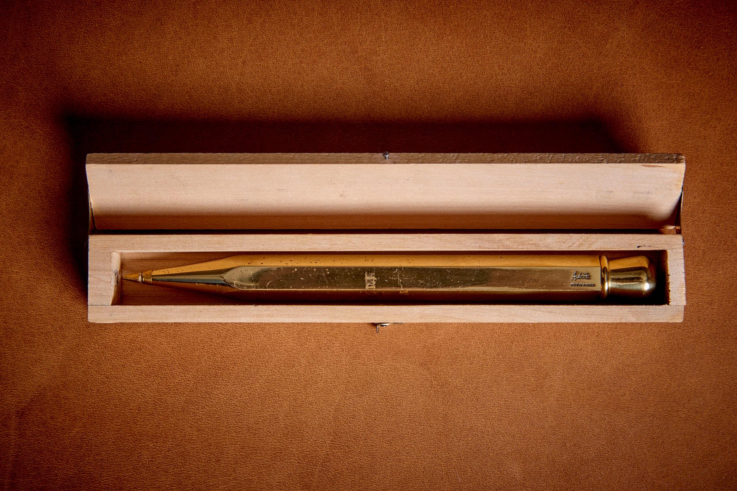 Mid-Century Modern Carl Auböck pen brass paperweight in original wooden box, Austria 1950s  For Sale