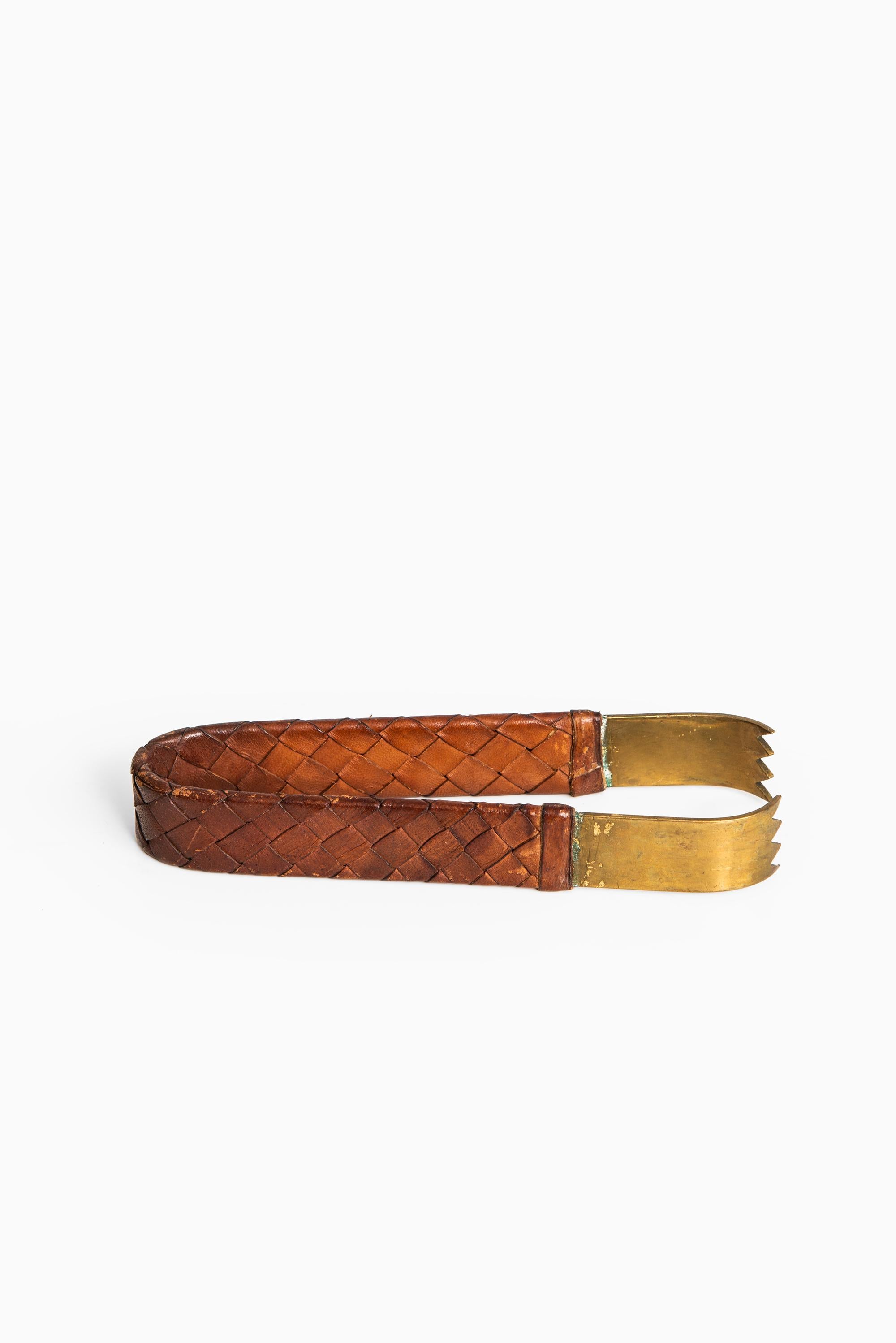 Mid-20th Century Carl Auböck Pincer in Braided Leather and Brass