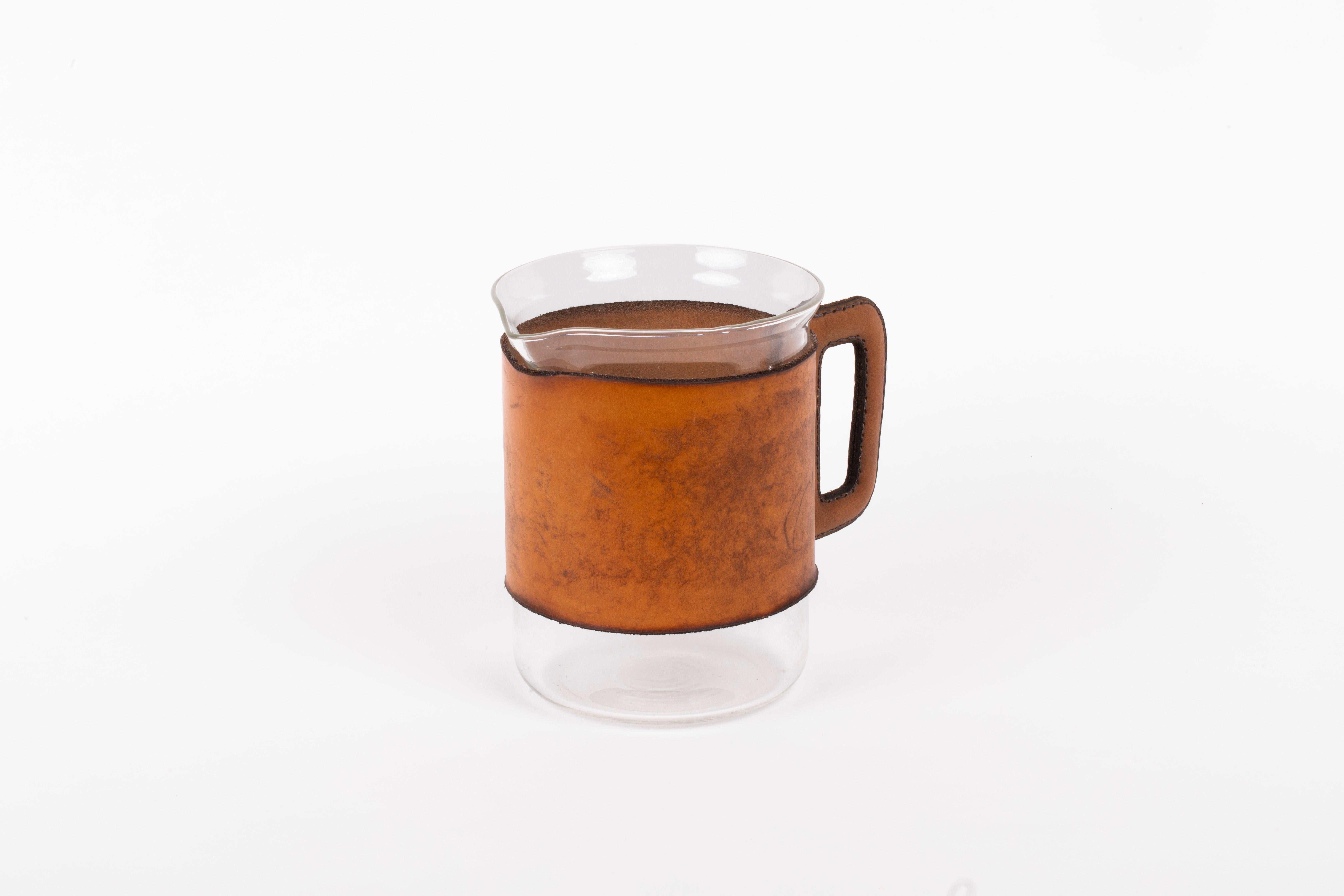 Carl Auböck pitcher, Austria 1960s. The width of the item including the handle is 18 cm.