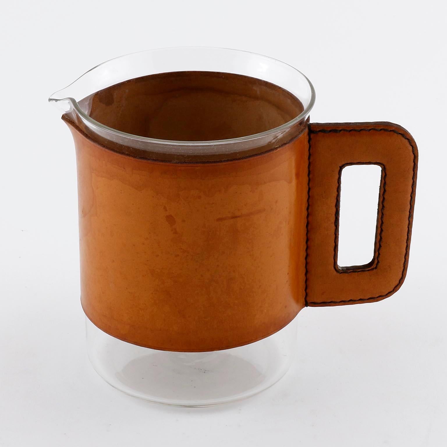 A pitcher designed by Carl Auböck, manufactured by Carl Auböck workshop in midcentury, Vienna, circa 1950.
An authentic handmade piece in very good original condition.

Carl Auböck, Carl Auboeck, Carl Aubock.