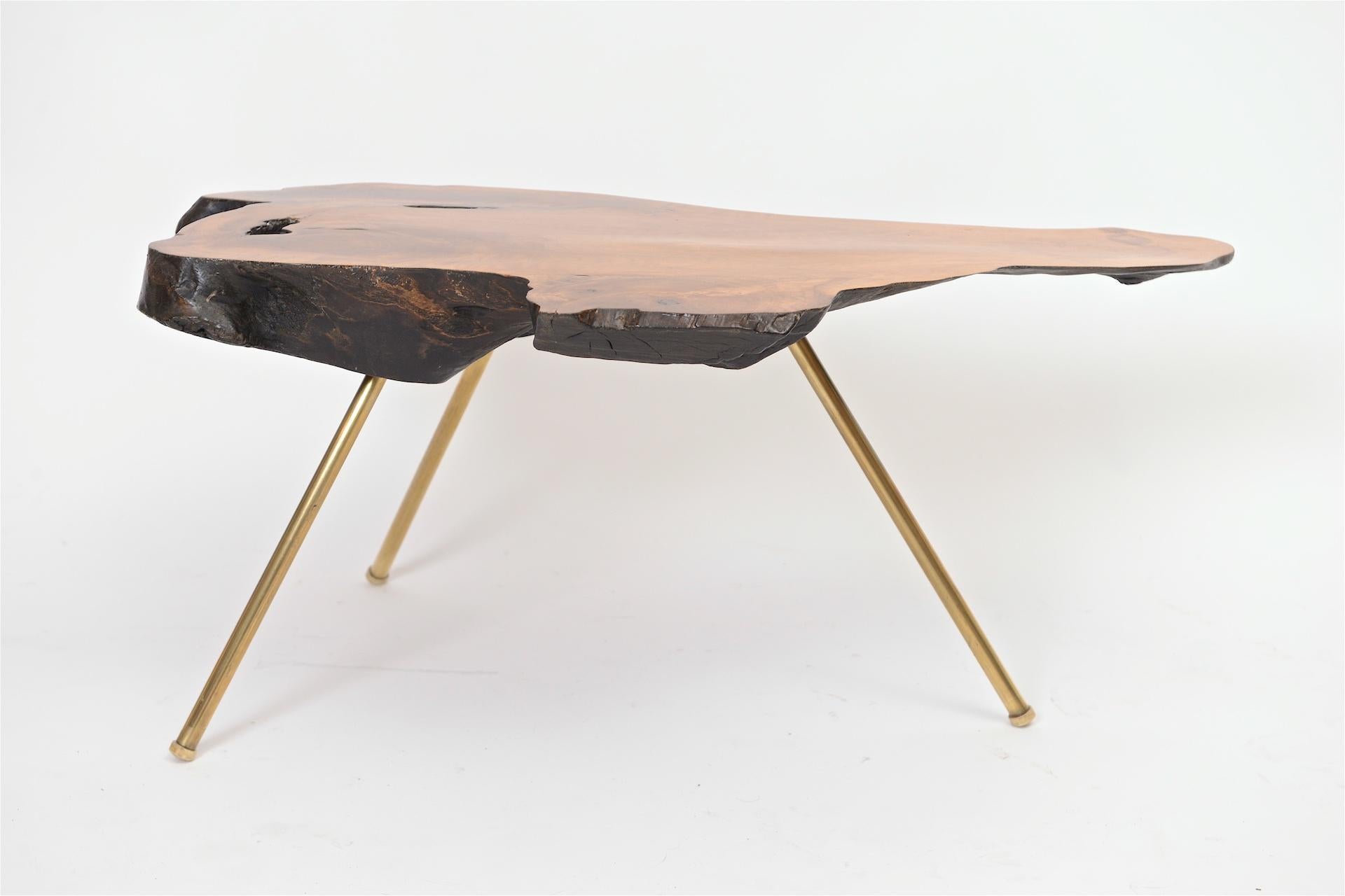 Very nice example of a Carl Aubock table, circa 1950s, Austria.

Beautiful patina to wood and brass.

 