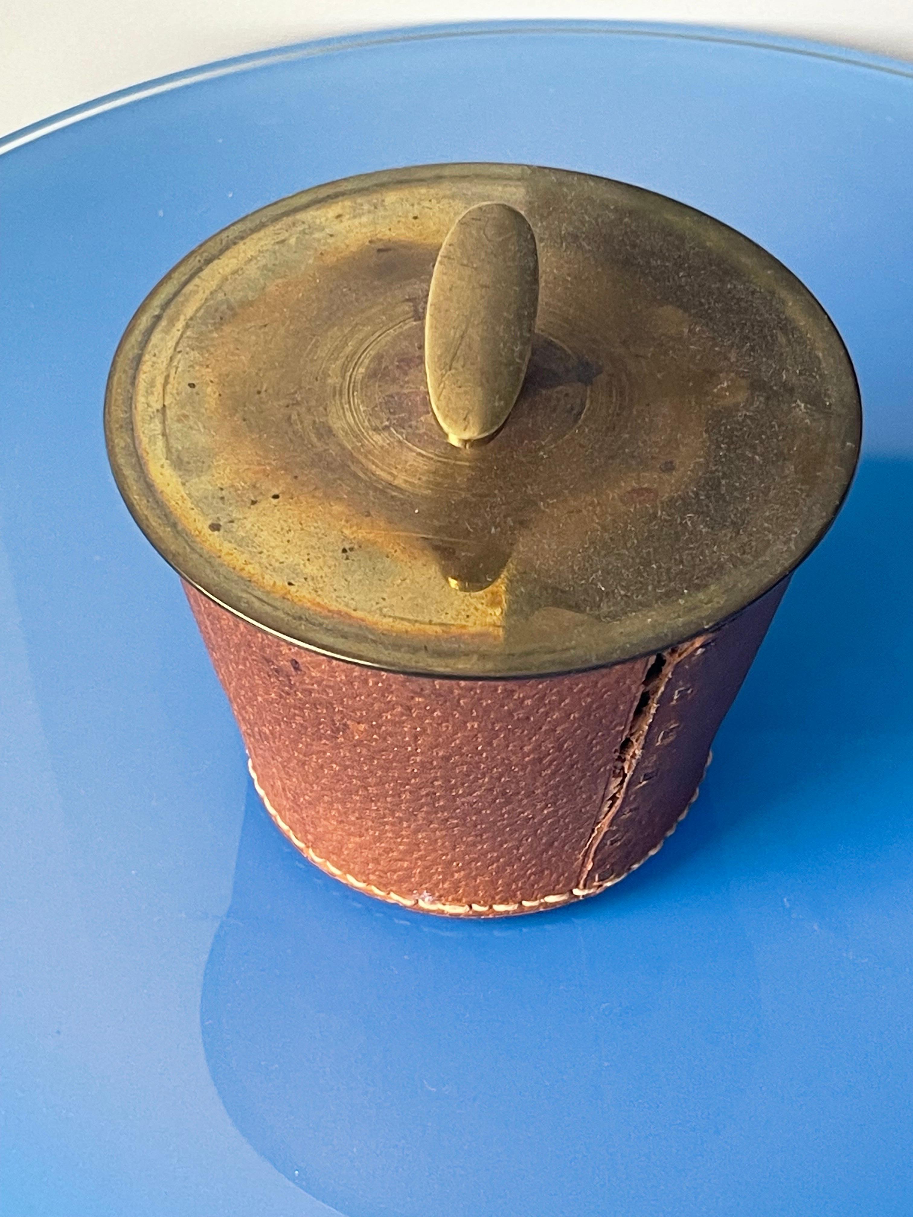 Small tobacco tin by Carl Aubock. 1940s Austria. 
Measures: 4.75