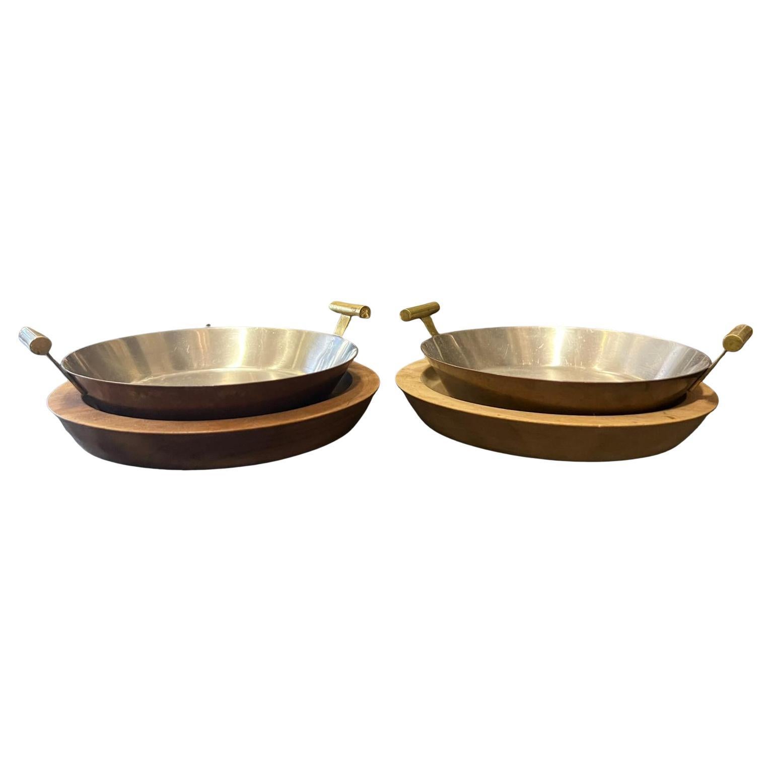 Carl Auböck 1960s, Two copper pans with wooden plate, Vienna Austria, good original condition.
 