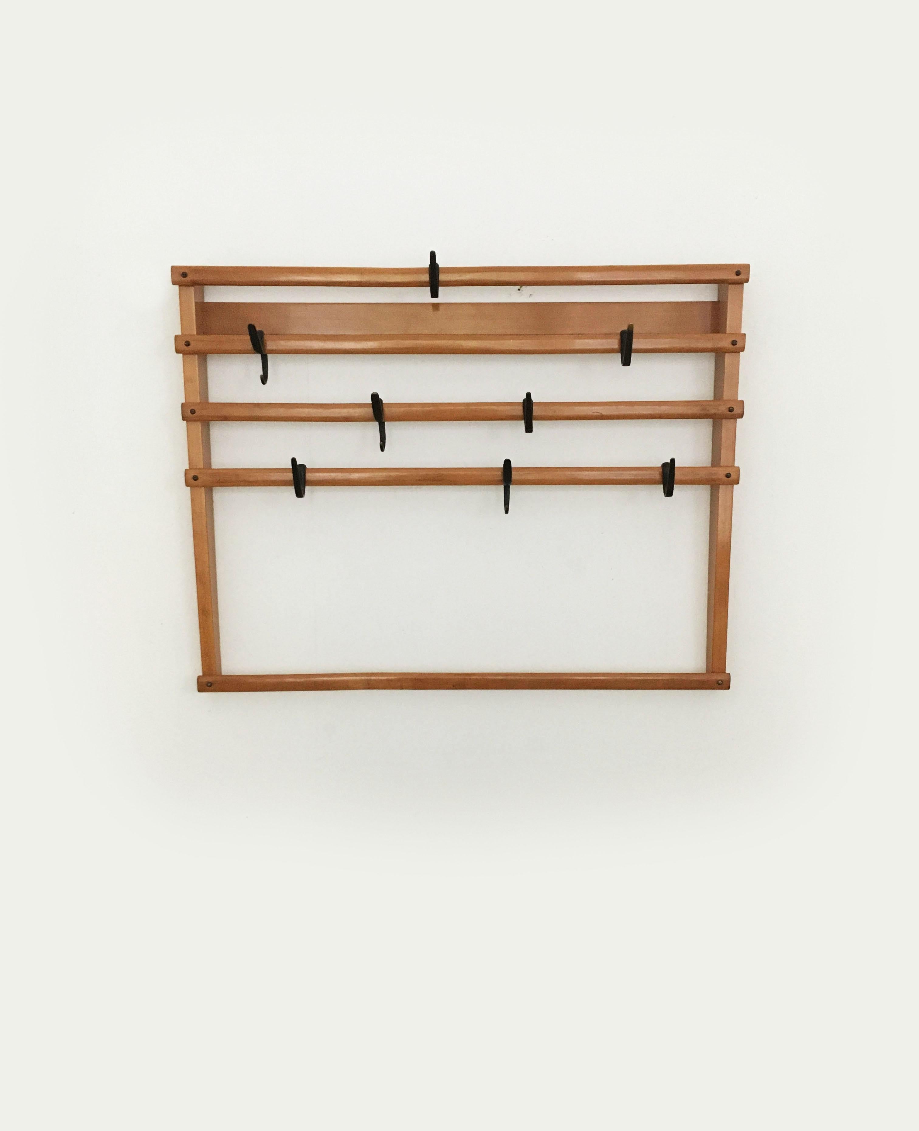 Carl Auböck II. Wall-Mounted Coat Rack Wardrobe, Austria 1960s Comes with 8 patinated Carl Auböck brass hocks.