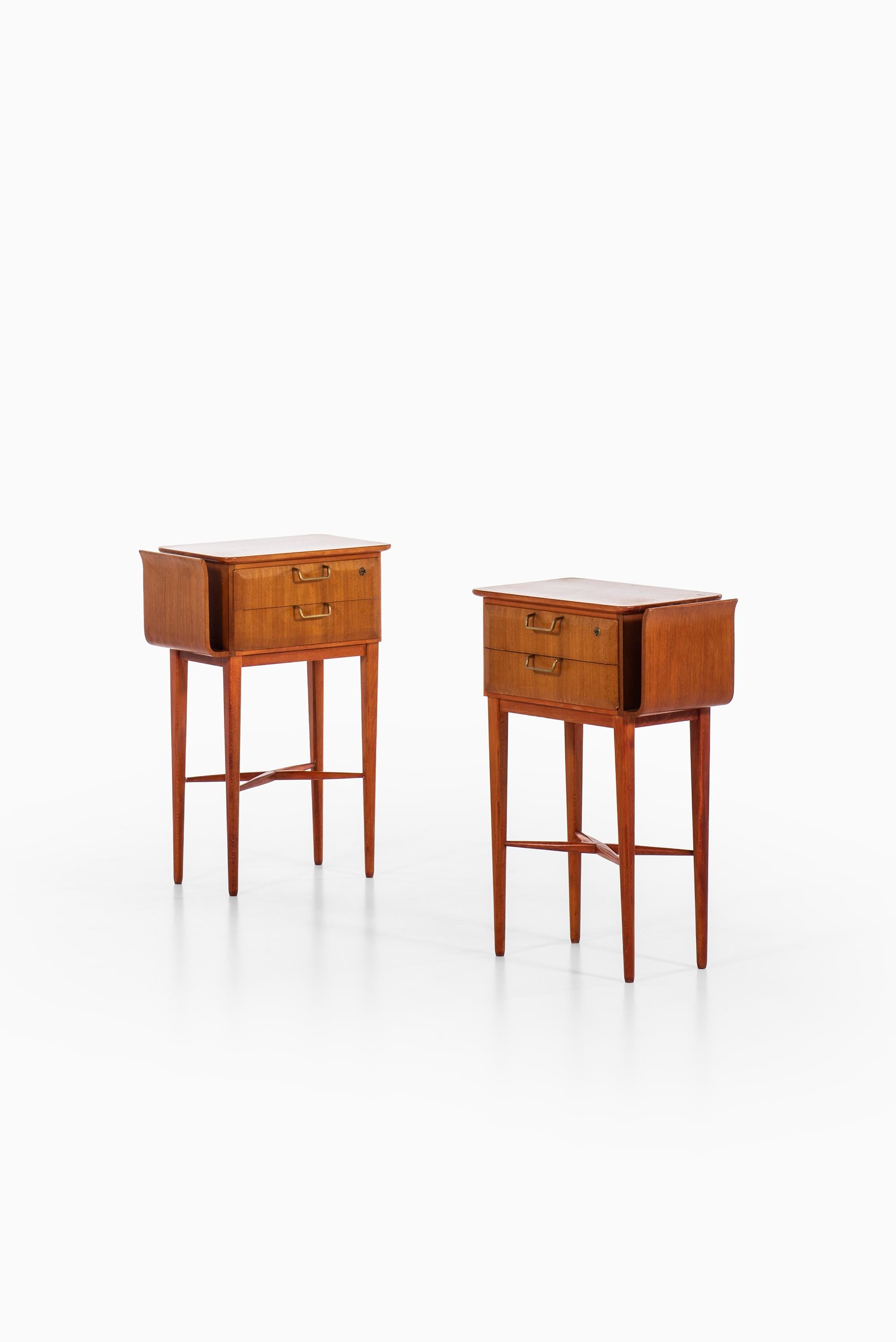 Very rare pair of bedside tables designed by Carl-Axel Acking. Produced by Bodafors in Sweden.