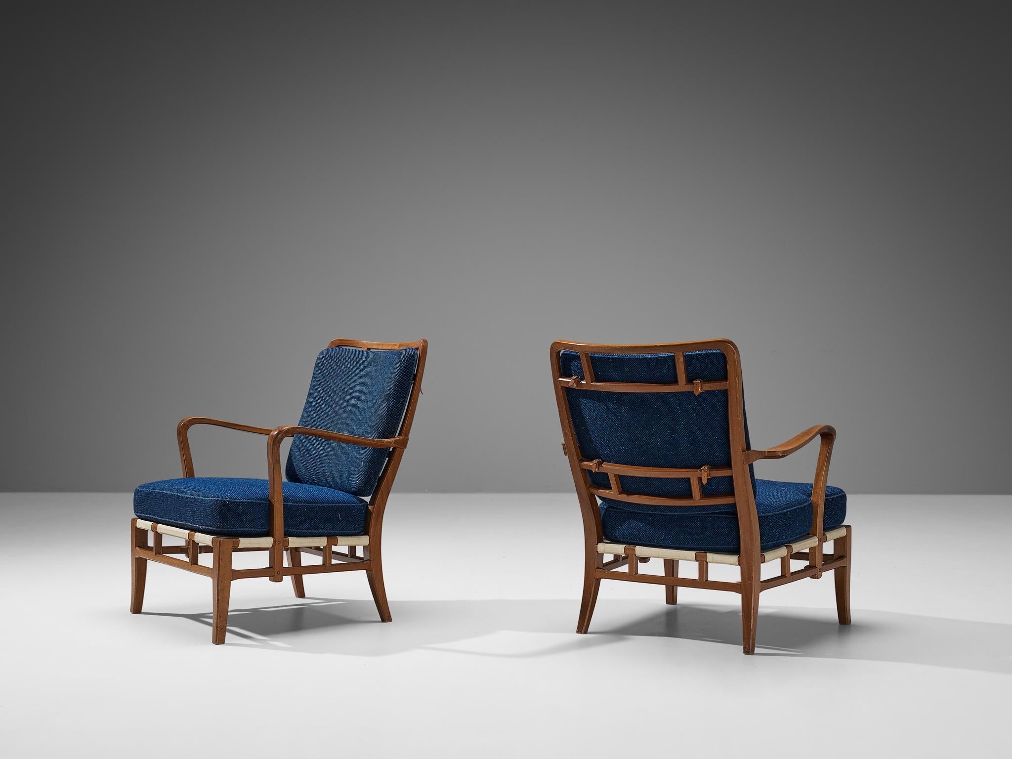 Carl-Axel Acking for Nordiska Kompaniet Hantverk, lounge chairs, mahogany, fabric, Sweden, 1940s

Beautiful set of chairs with an important provenance. These chairs are designed and previously owned by Carl-Axel Acking. Made in a rich mahogany wood