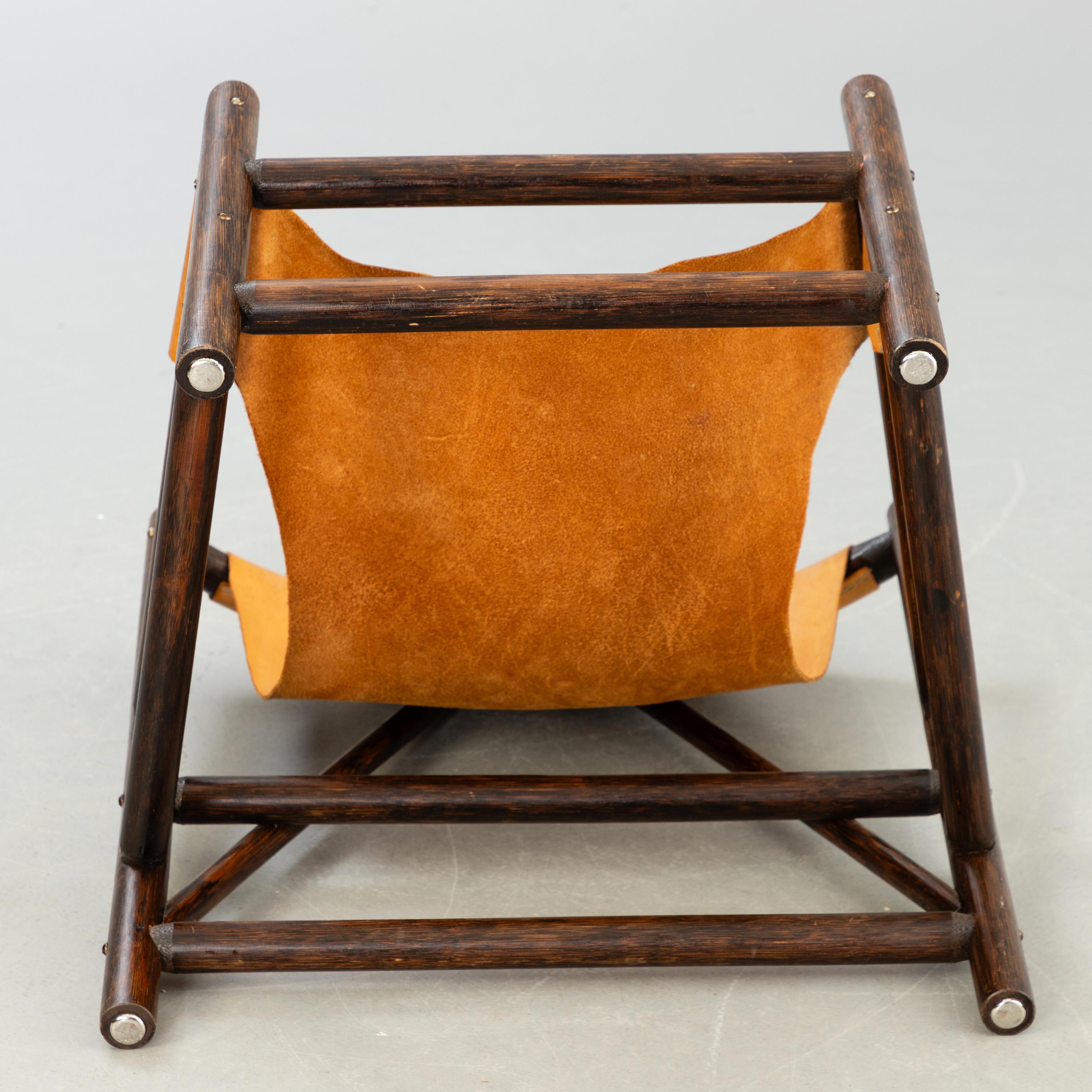 Fauteuil de style Carl Axel Acking en bois et cuir Suède 1960 Bon état - En vente à Paris, FR