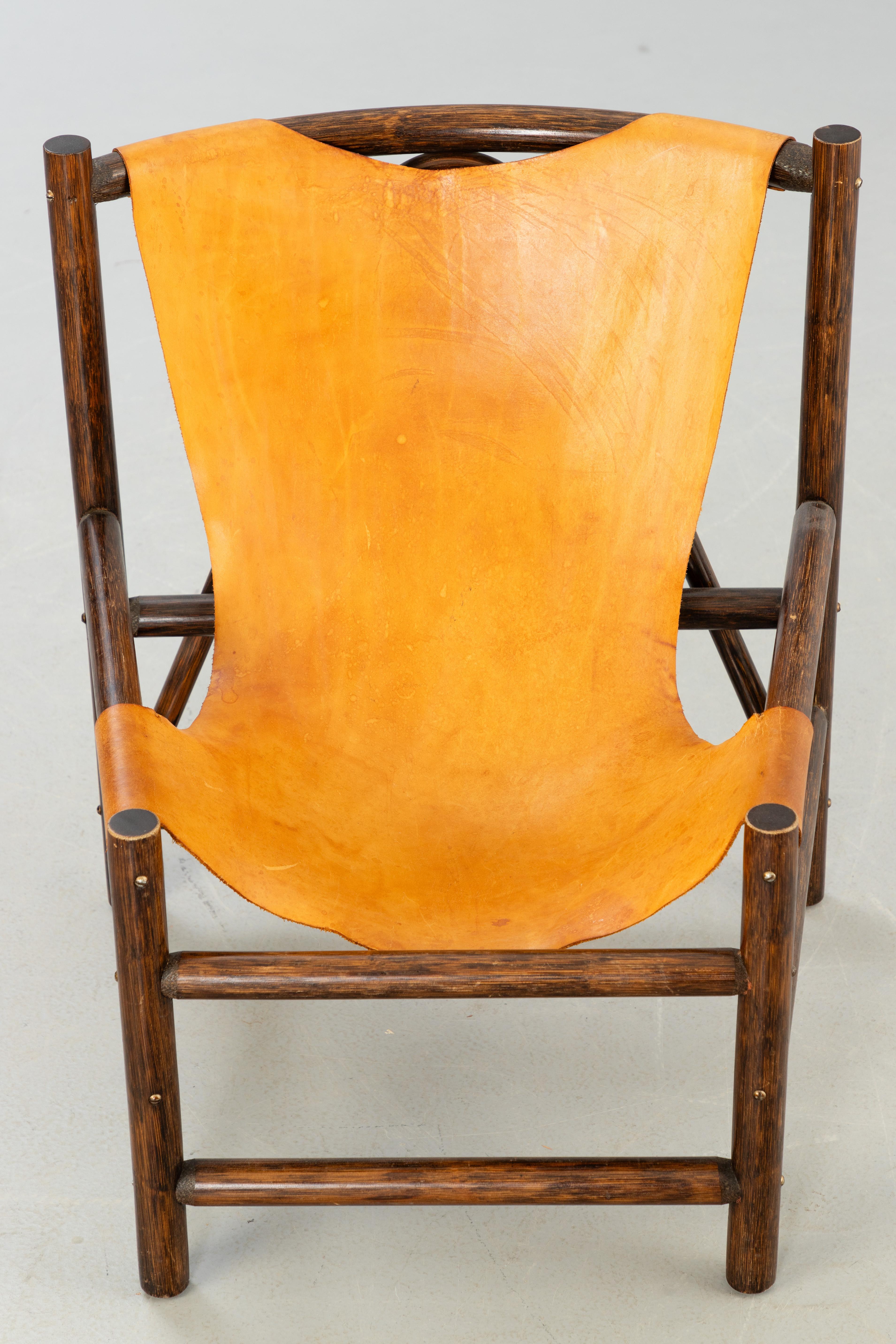 Leather Carl Axel Acking style armchair wood and leather Sweden 1960 For Sale