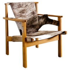 Carl-Axel Acking "Trienna" Arm Chair in Oak and Cow Hide Produced in Sweden 1950