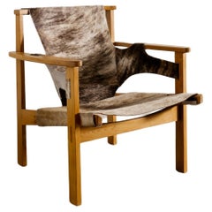 Carl-Axel Acking "Trienna" Armchair in Oak & Cow Hide Produced in Sweden, 1950s