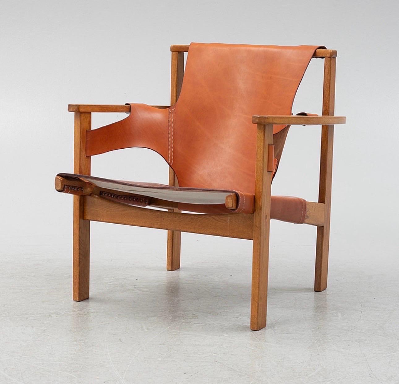 Carl-Axel Acking Trienna chair in Oak, Sweden 1960s for Nordiska Kompaniet. 
Seat height 35cm, width 69cm. 

