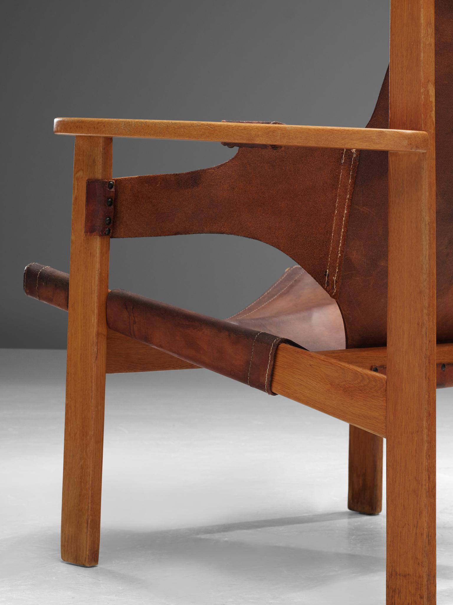 Mid-20th Century Carl Axel Acking 'Trienna' Chairs in Patinated Brown Leather